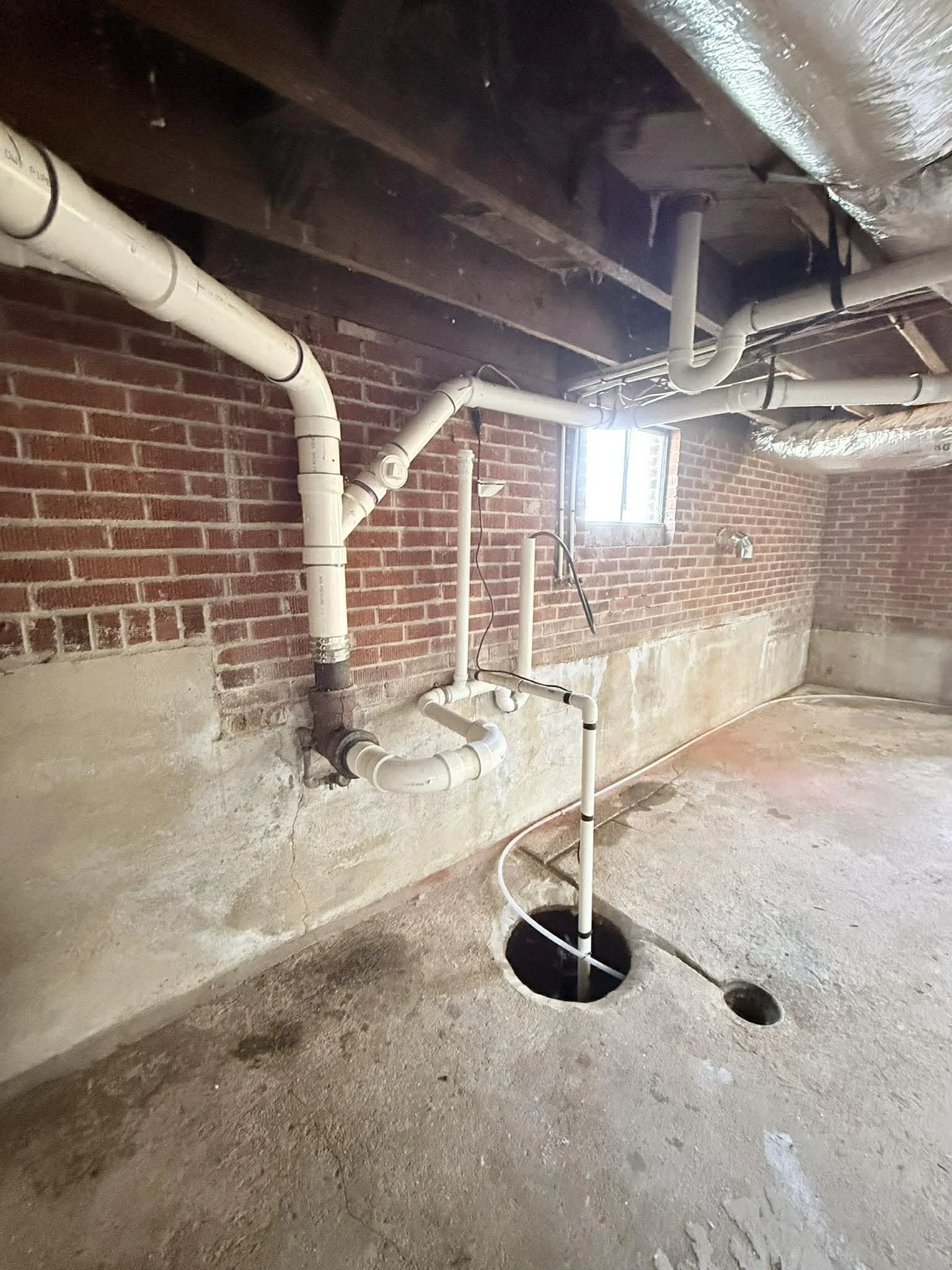 Washer and dryer hookup water lines, vents and PVC drain piping