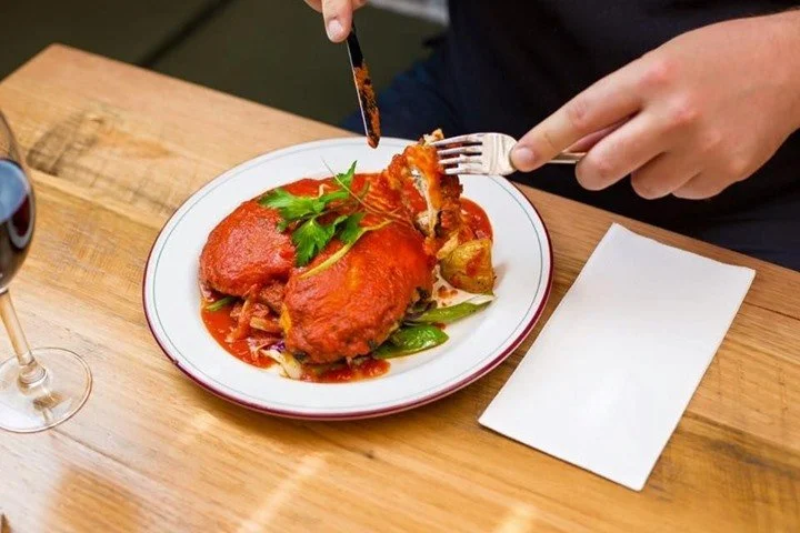 What Is Chicken Parmigiana? Exploring Its Origins and Taste