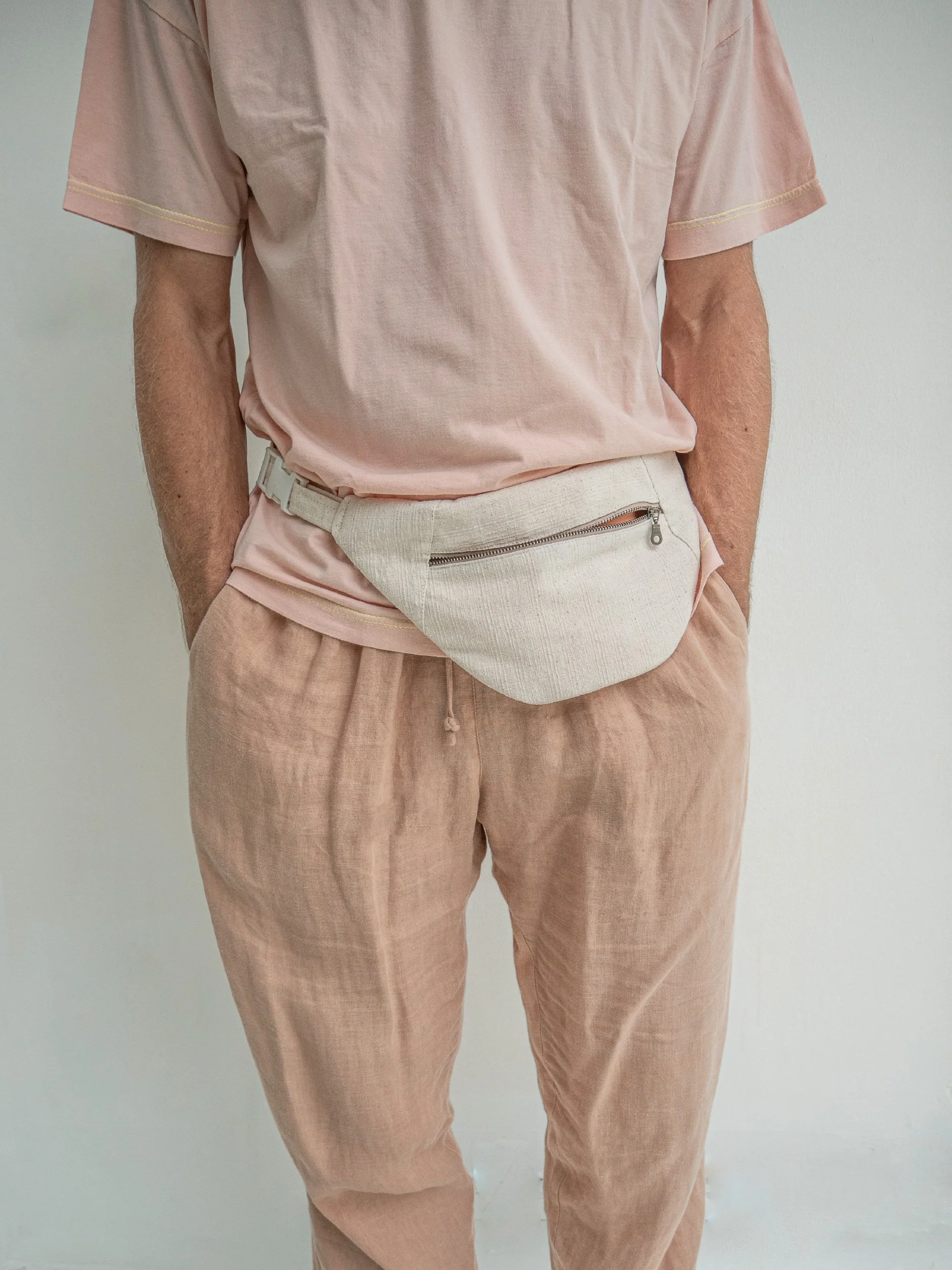 model image banana bag worn around the waist