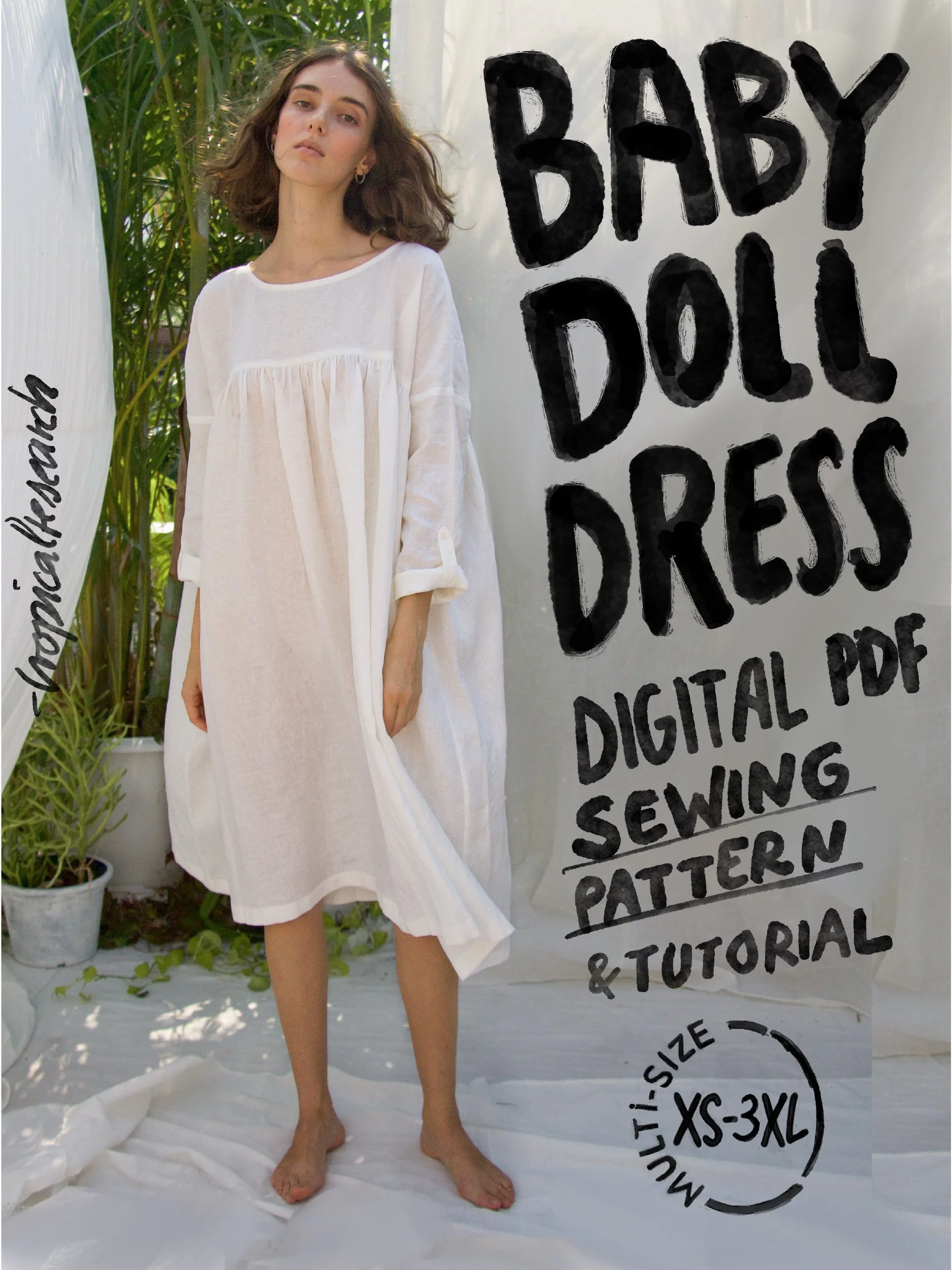 baby doll dress cover image with brunette model wearing a white dress
