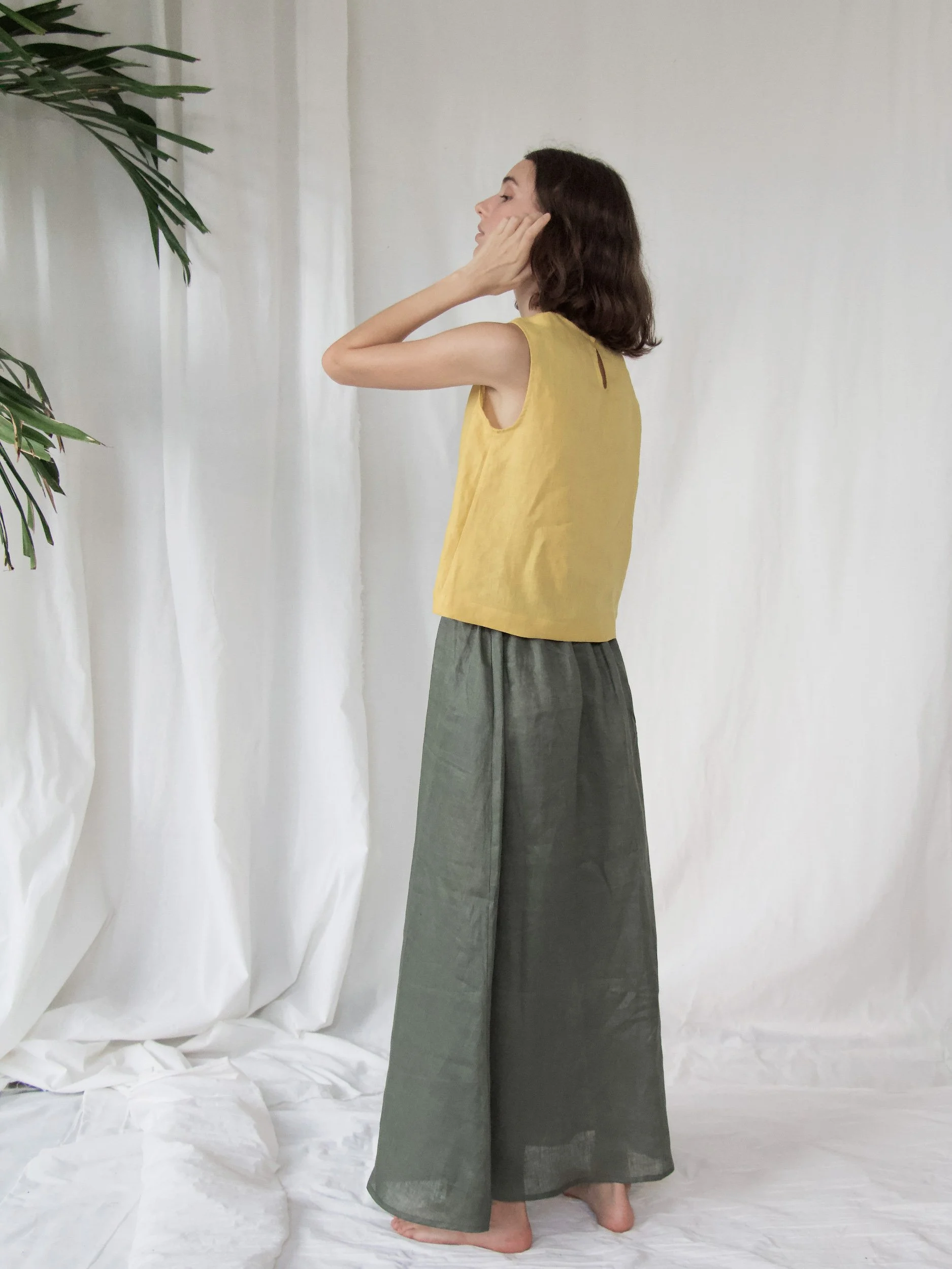 Lazy Skirt - model wearing green skirt with yellow top
