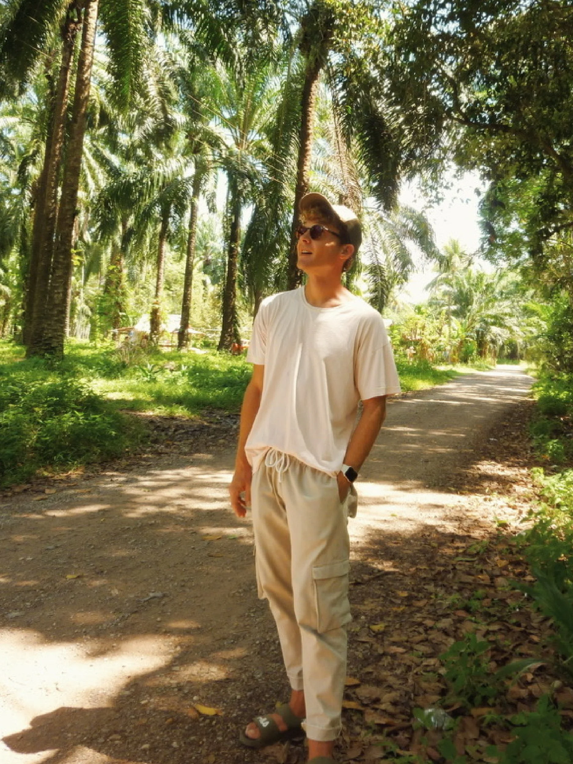 model wearing green cotton lazy pants with free cargo pockets upgrade