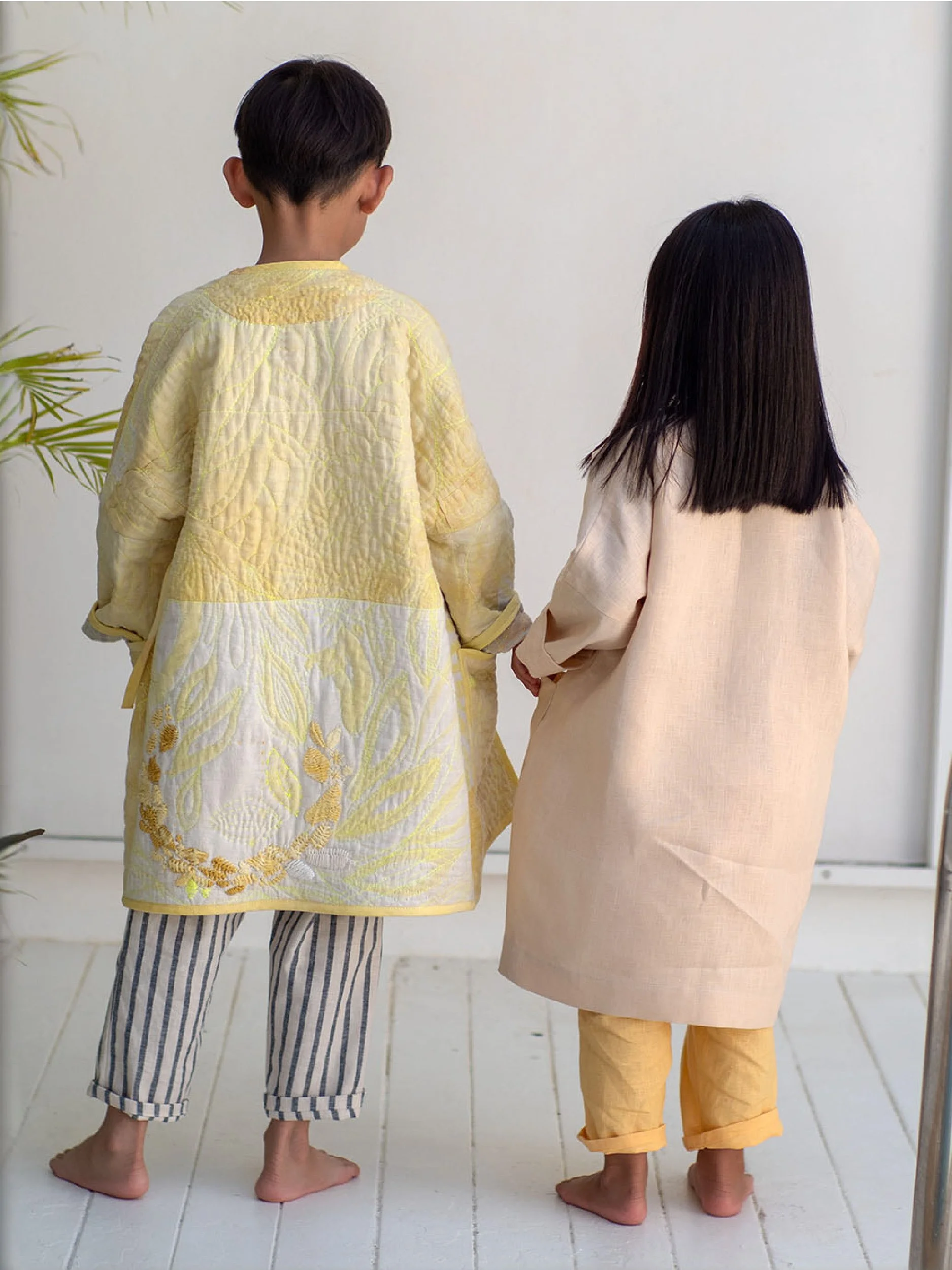 cozy coat for kids back view quilted and regular view