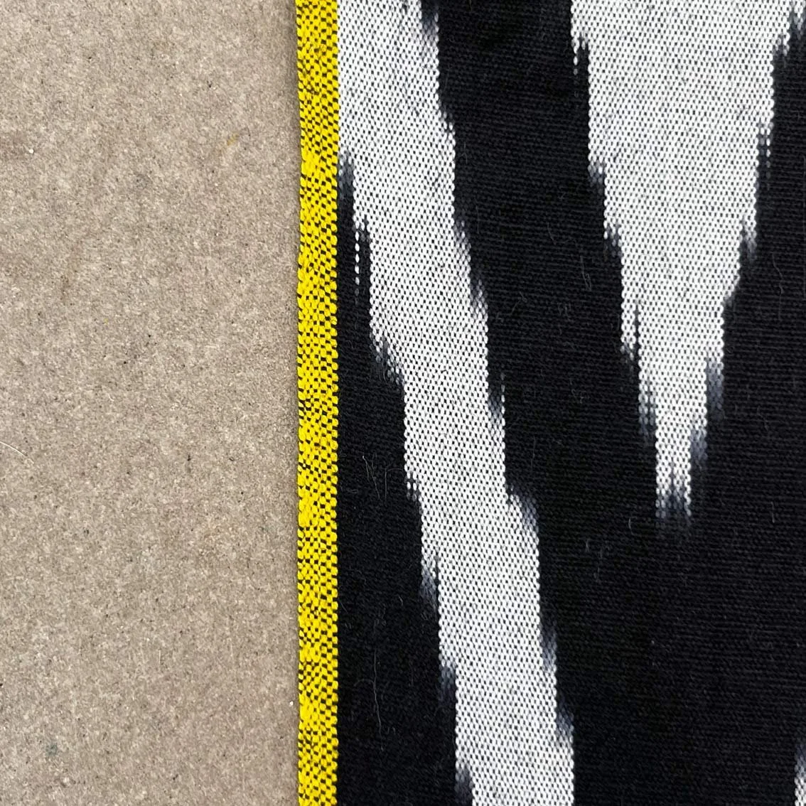 silk ikat with yellow selvage