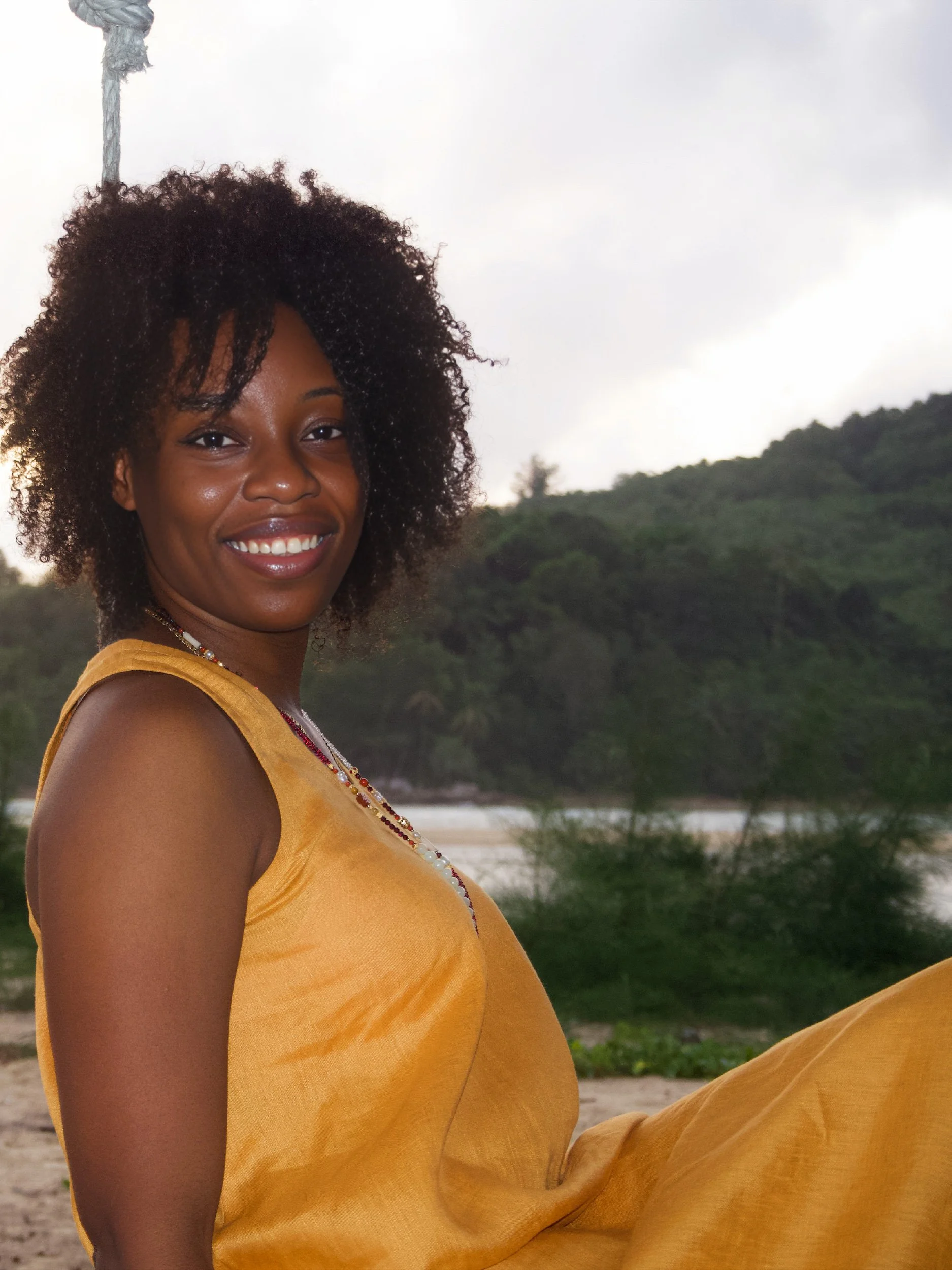 beach dress in orange on the beach - close up
