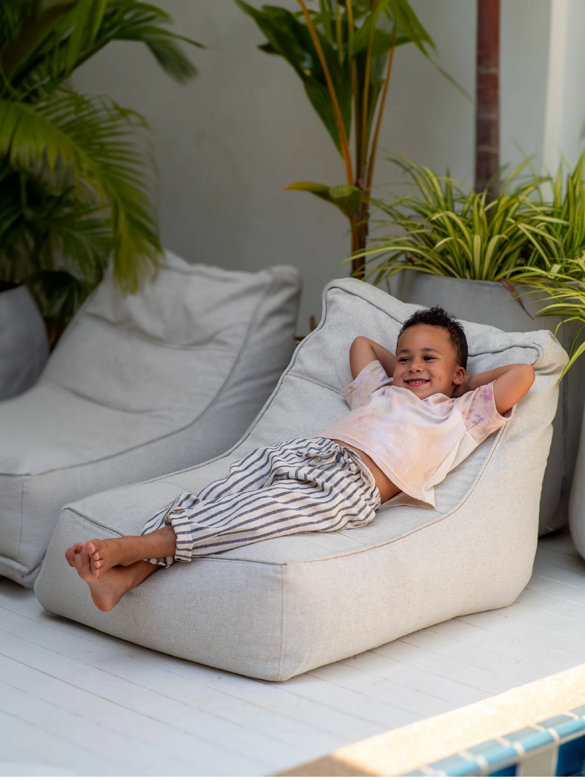 lazy pants for Kids - social media image boy on bean bag