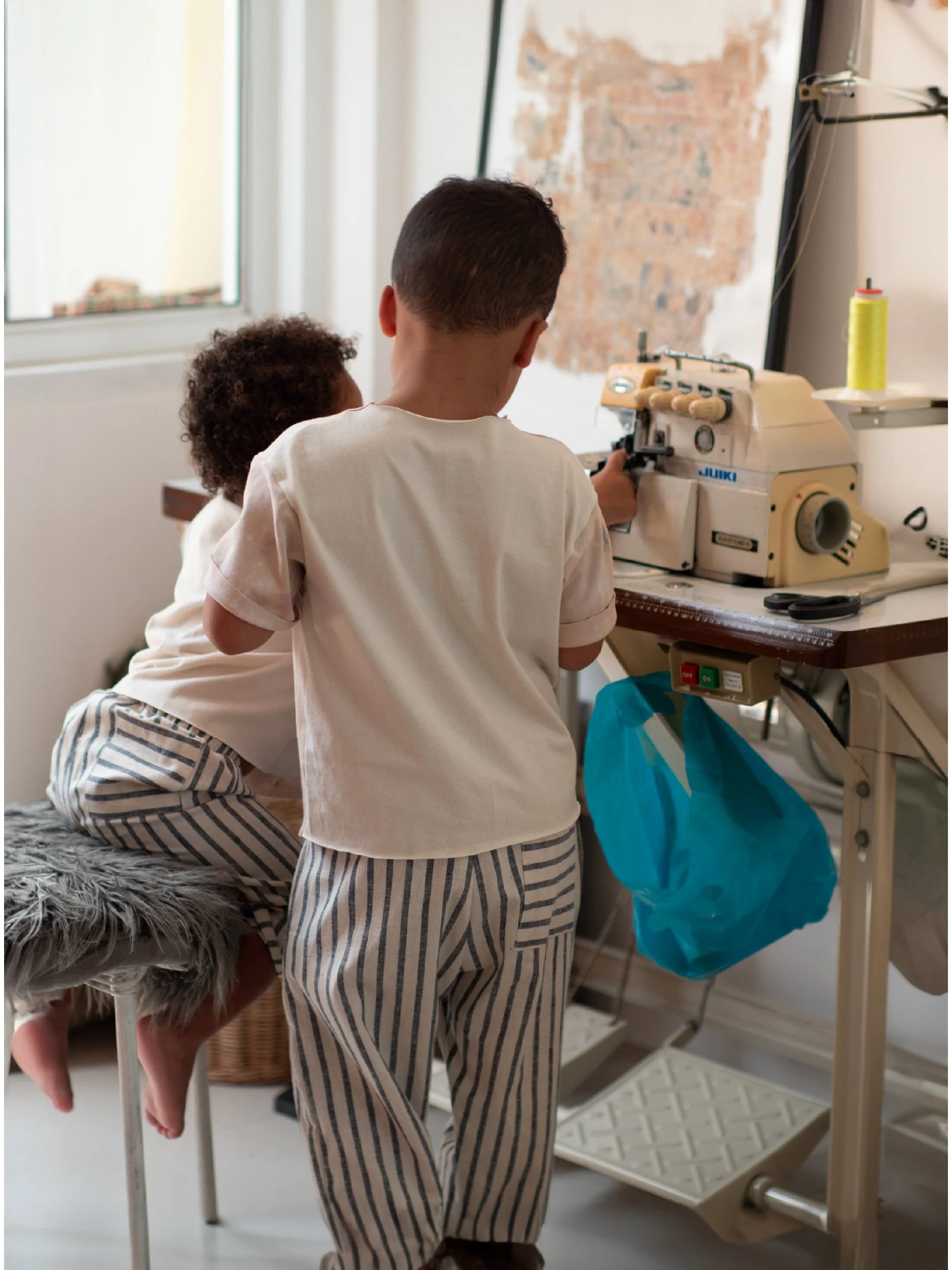 mood image kids at the serger