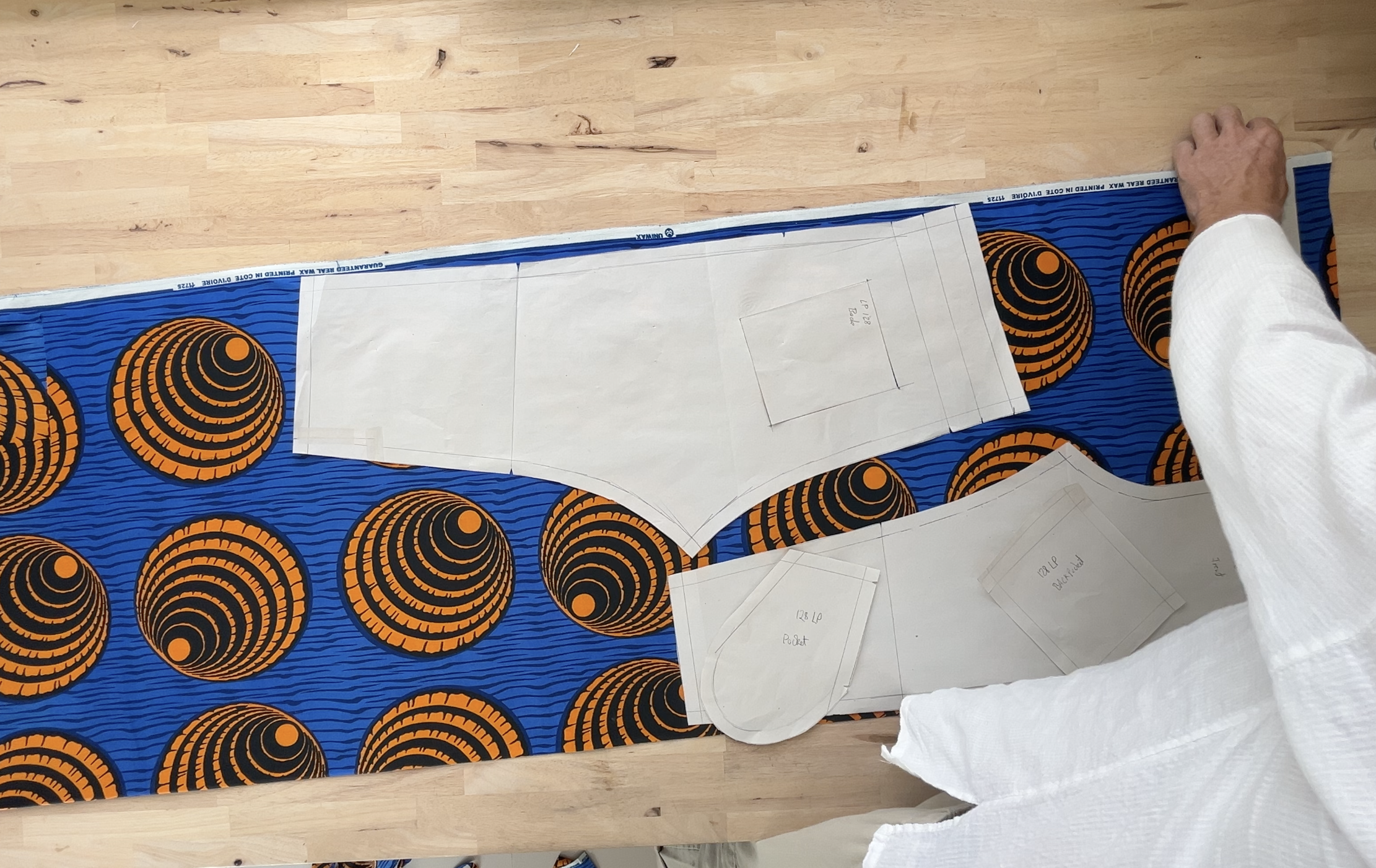 placing pattern pieces along the selvage of a printed cotton