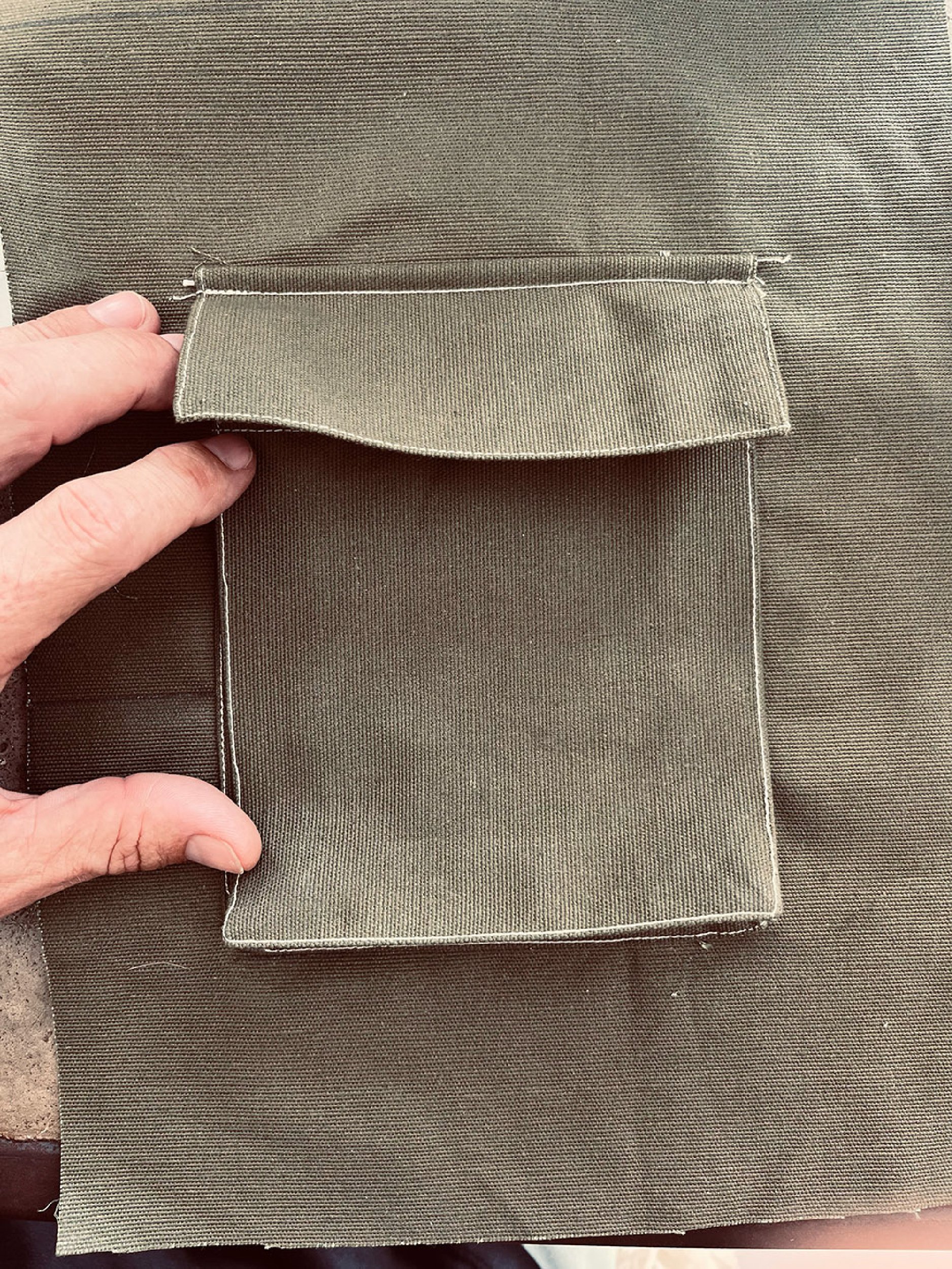 photo of a khaki green cargo pocket with flap made with the free pdf pattern