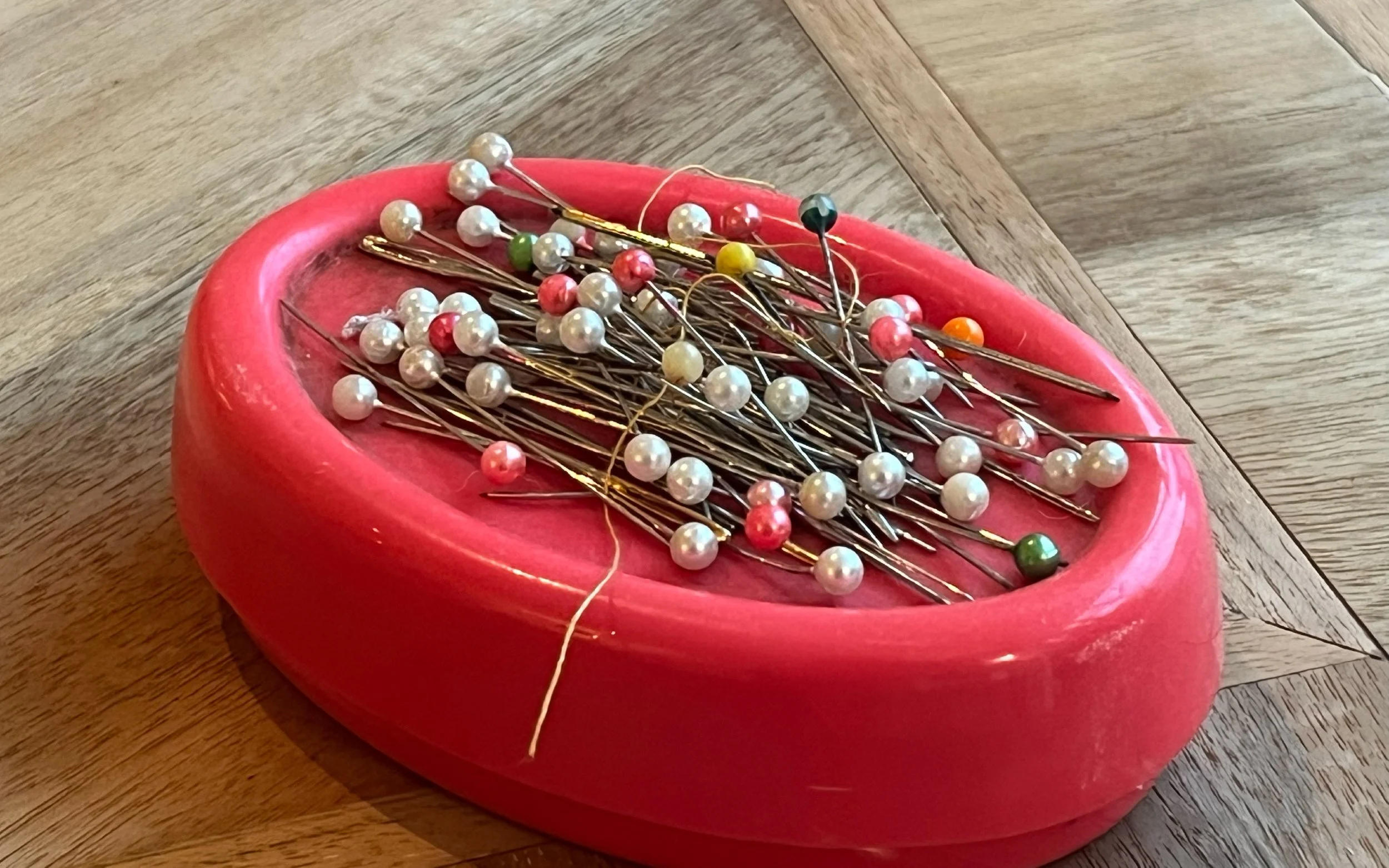 these in expensive plastic bead pins are widely available in Asia and do a pretty decent job.