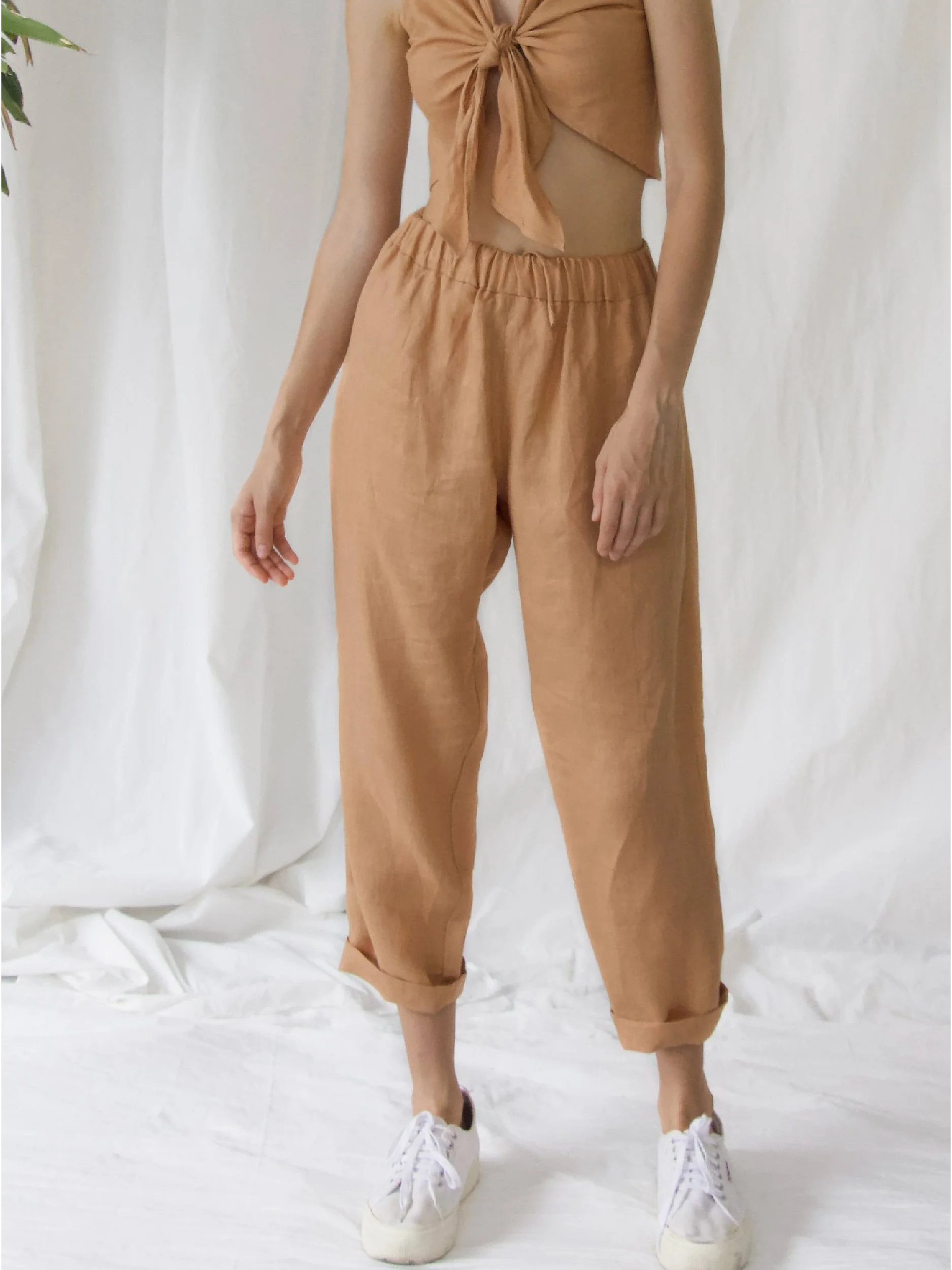 model wearing brown linen lazy pants