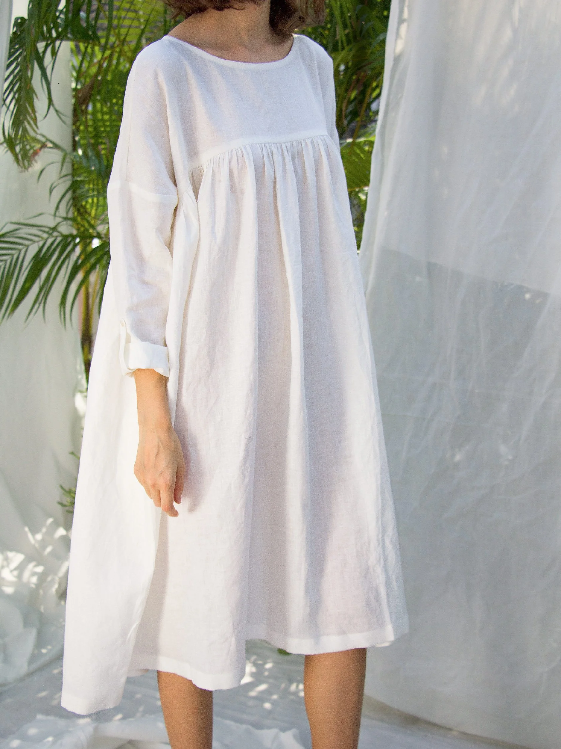 baby doll dress close up image - gathered seam across the chest