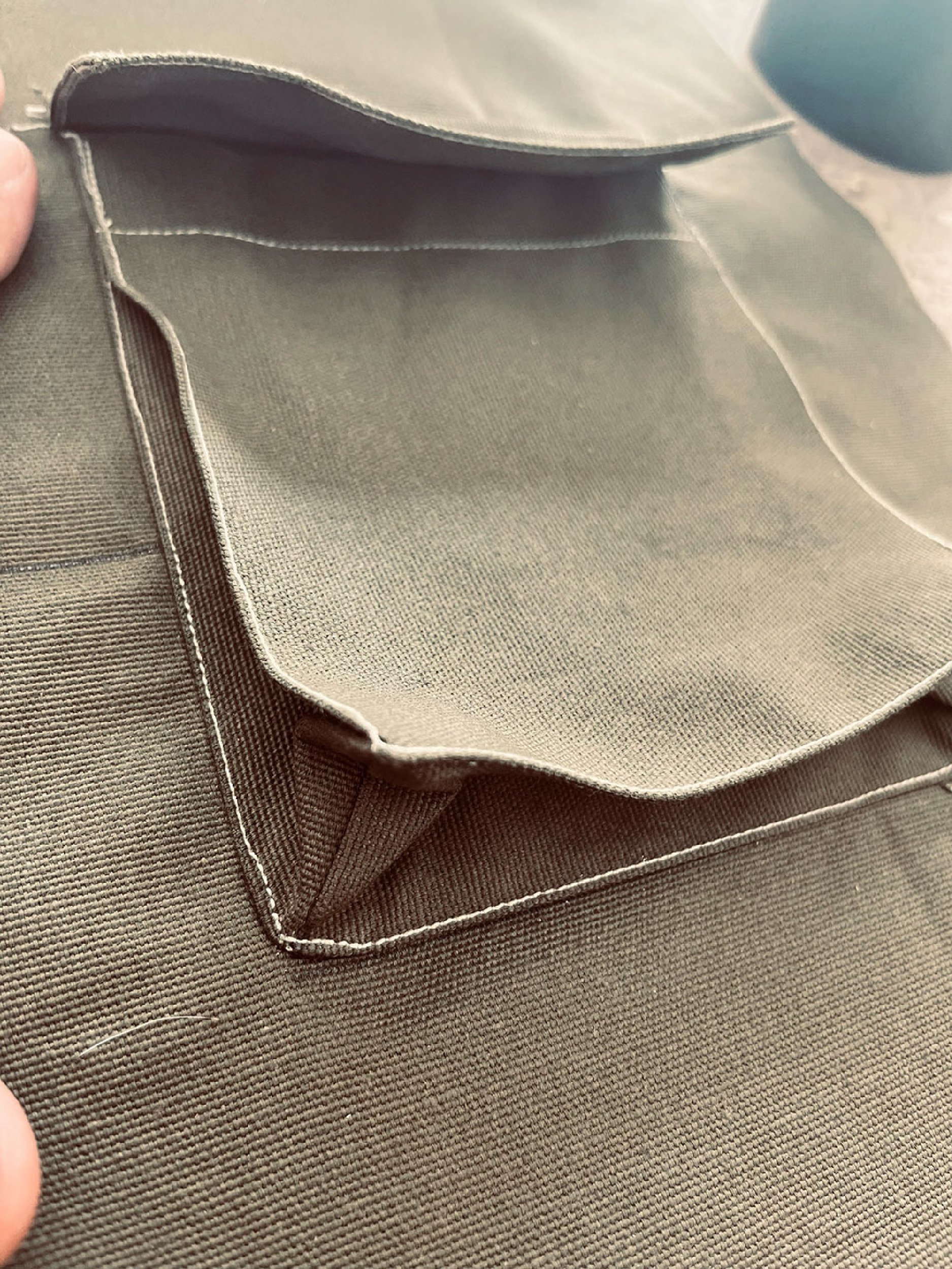 photo of a khaki green cargo pocket with flap made with the free pdf pattern