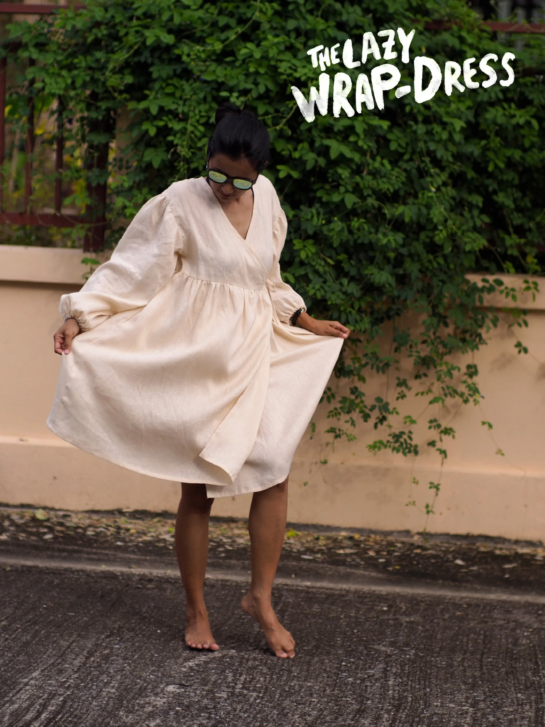 lazy wrap dress - model wearing beige version with long sleeves