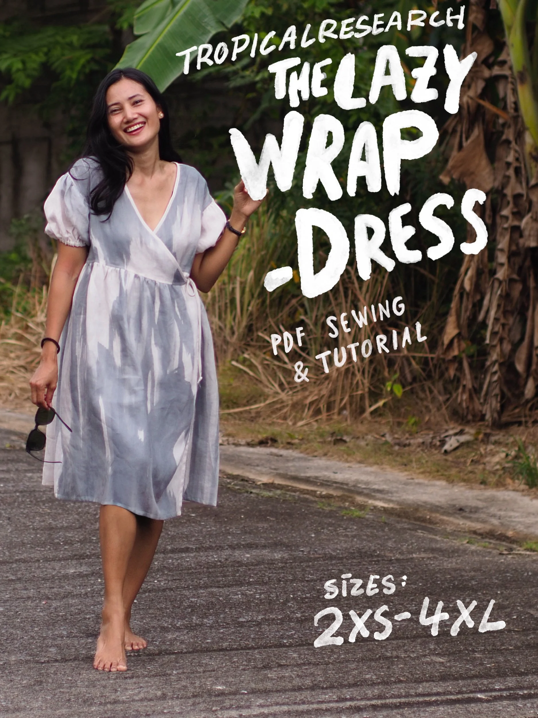 lazy wrap dress cover image - model wearing grey version with short puffy sleeves
