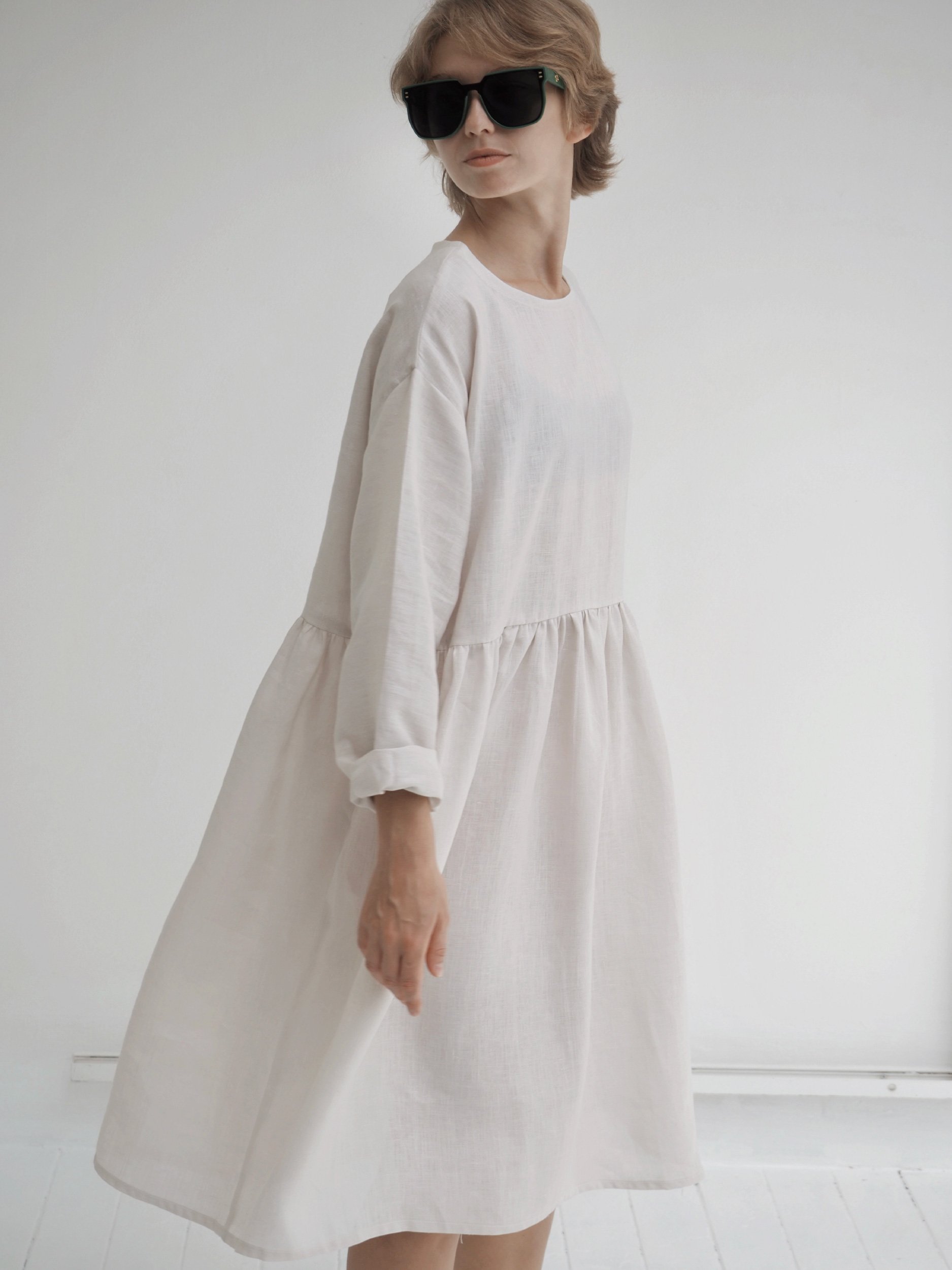 model wearing lazy top waist crop with long sleeves and long gathered extension