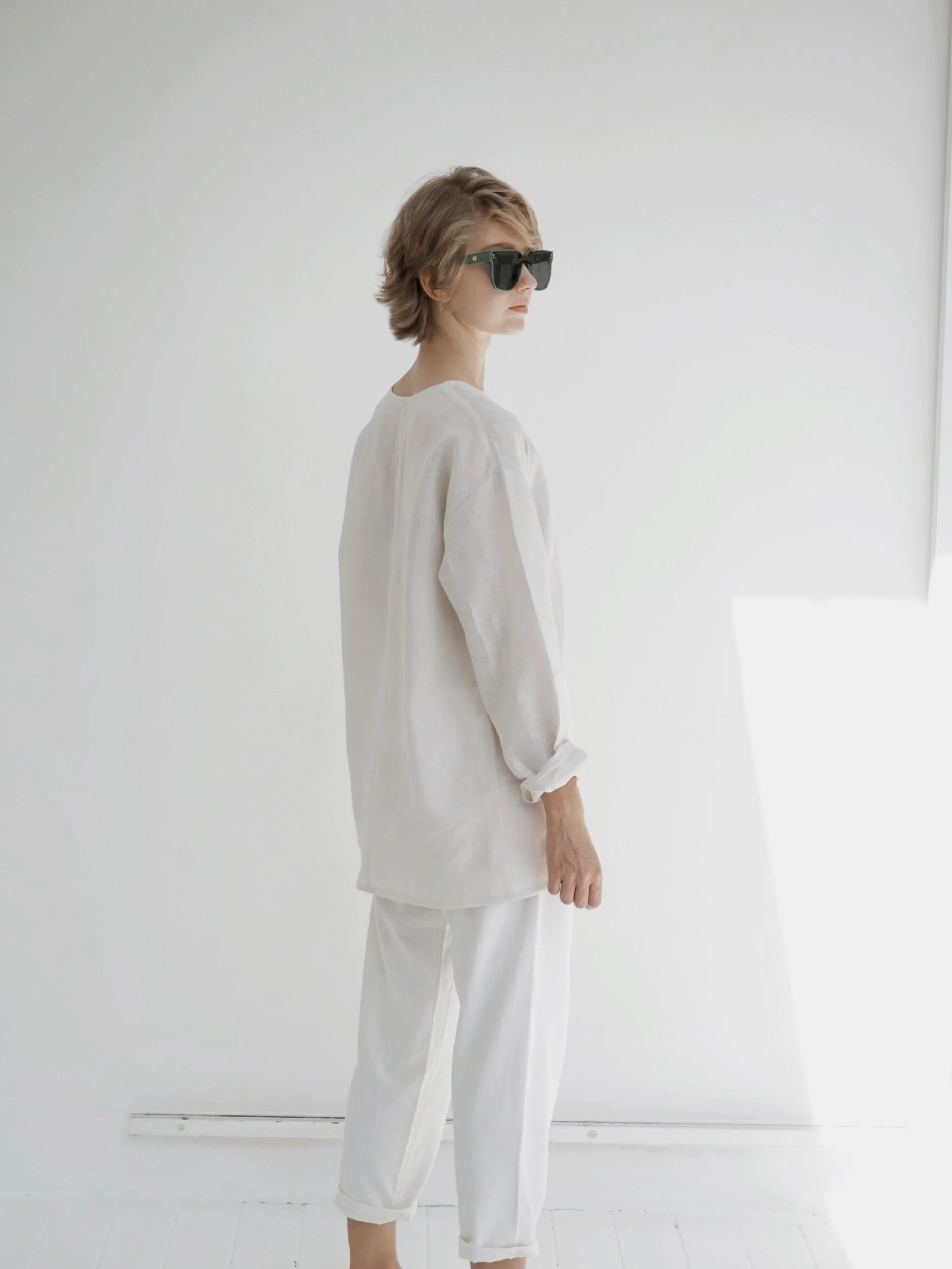 model wearing a full length lazy top with long sleeves