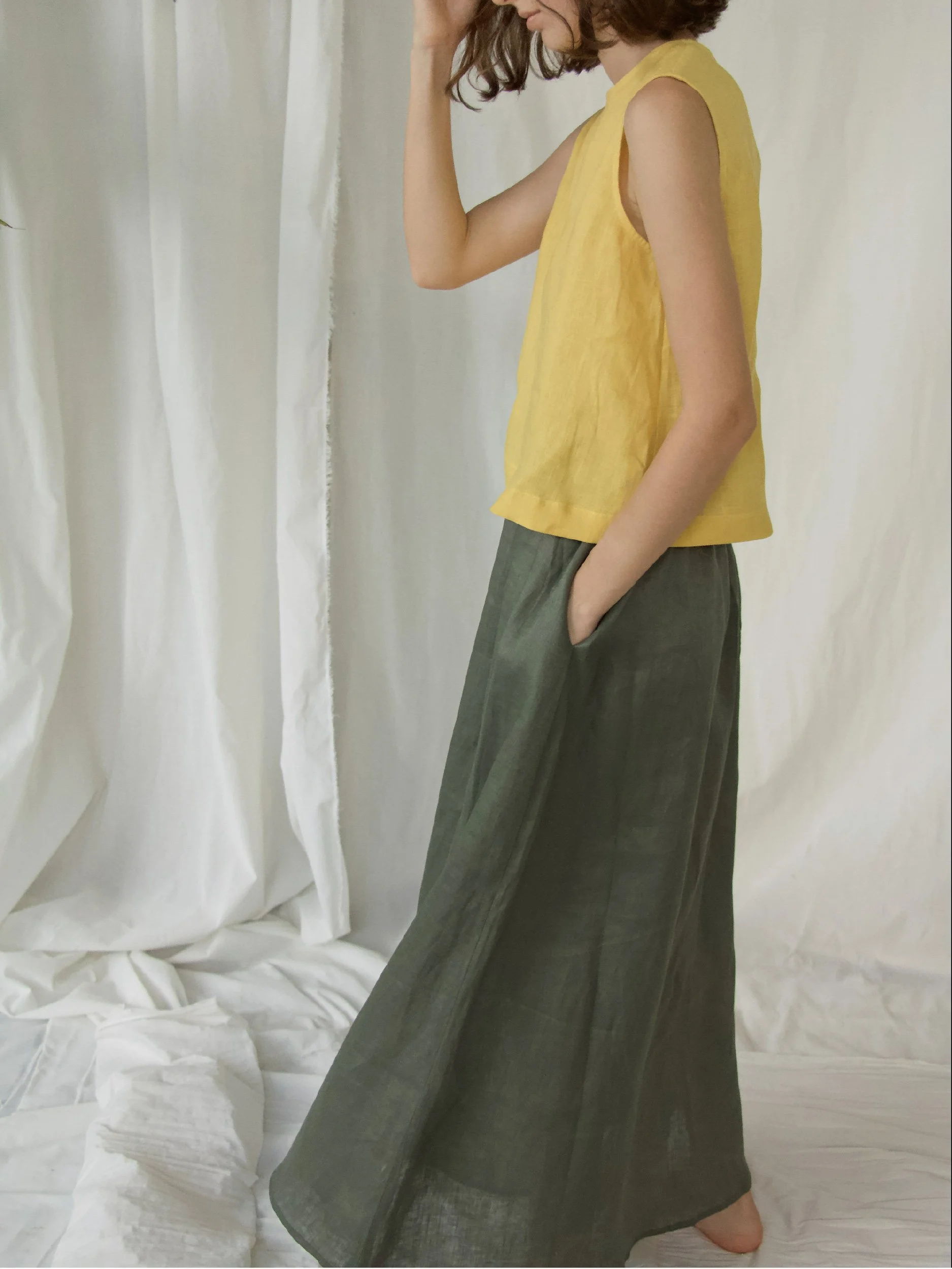 Lazy Skirt - model wearing green skirt with yellow top