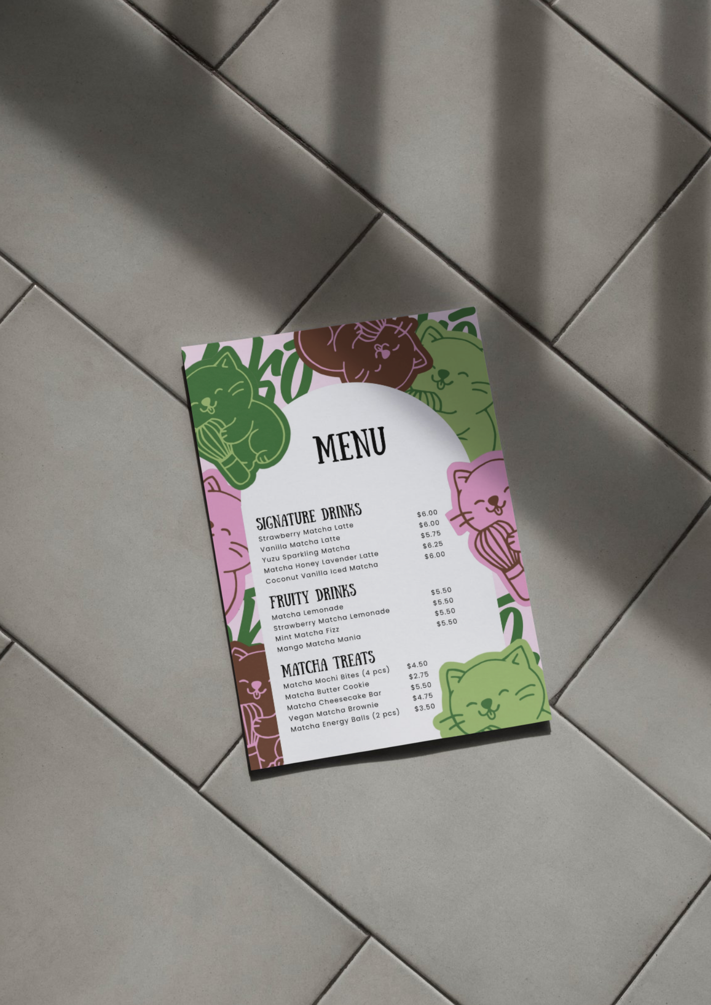 A colorful menu with cat illustrations on a tiled floor.
