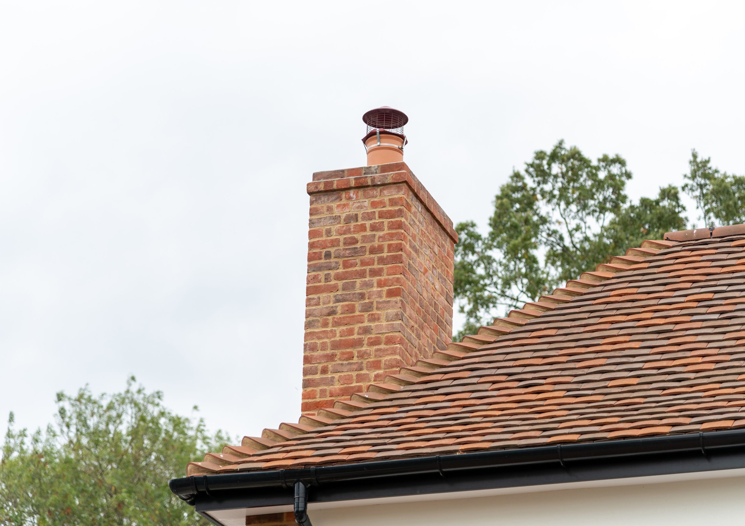 9. Finished bonnet tile hip and chimney 