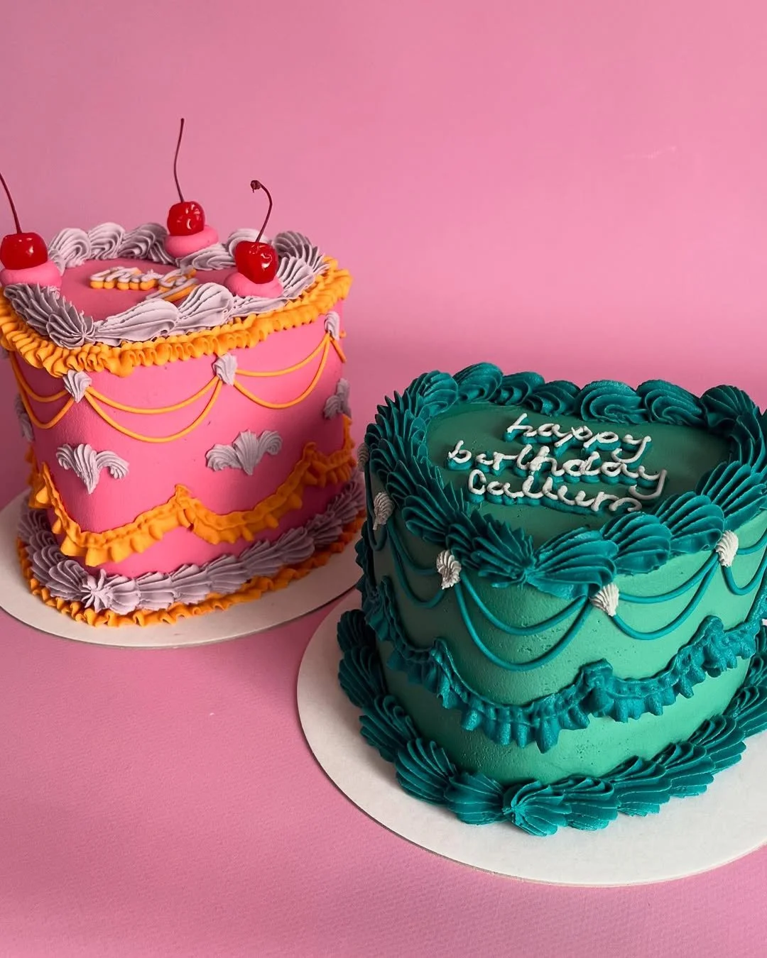 Pink and teal heart shaped cake