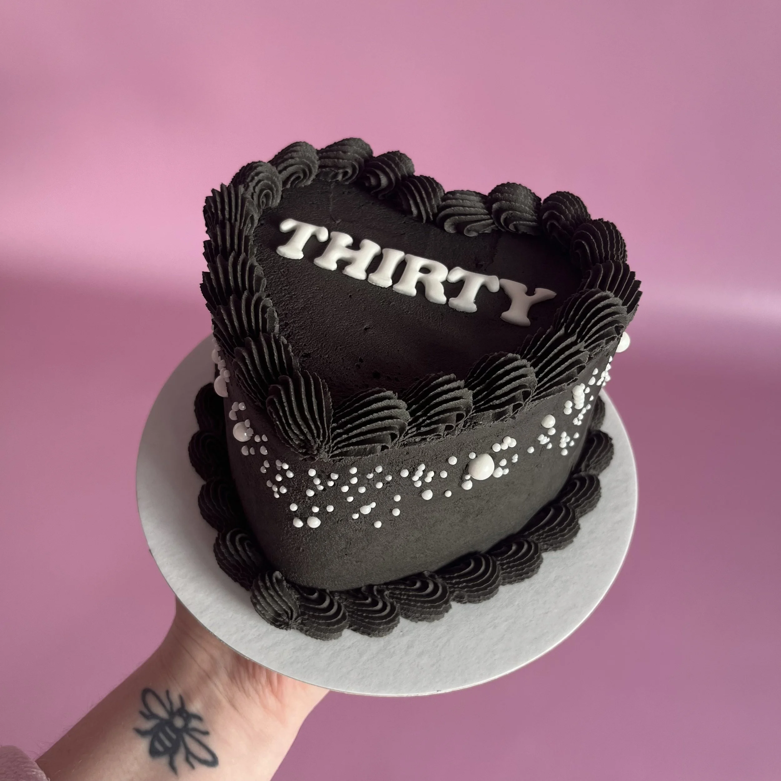 Black heart cake with pearls.jpeg