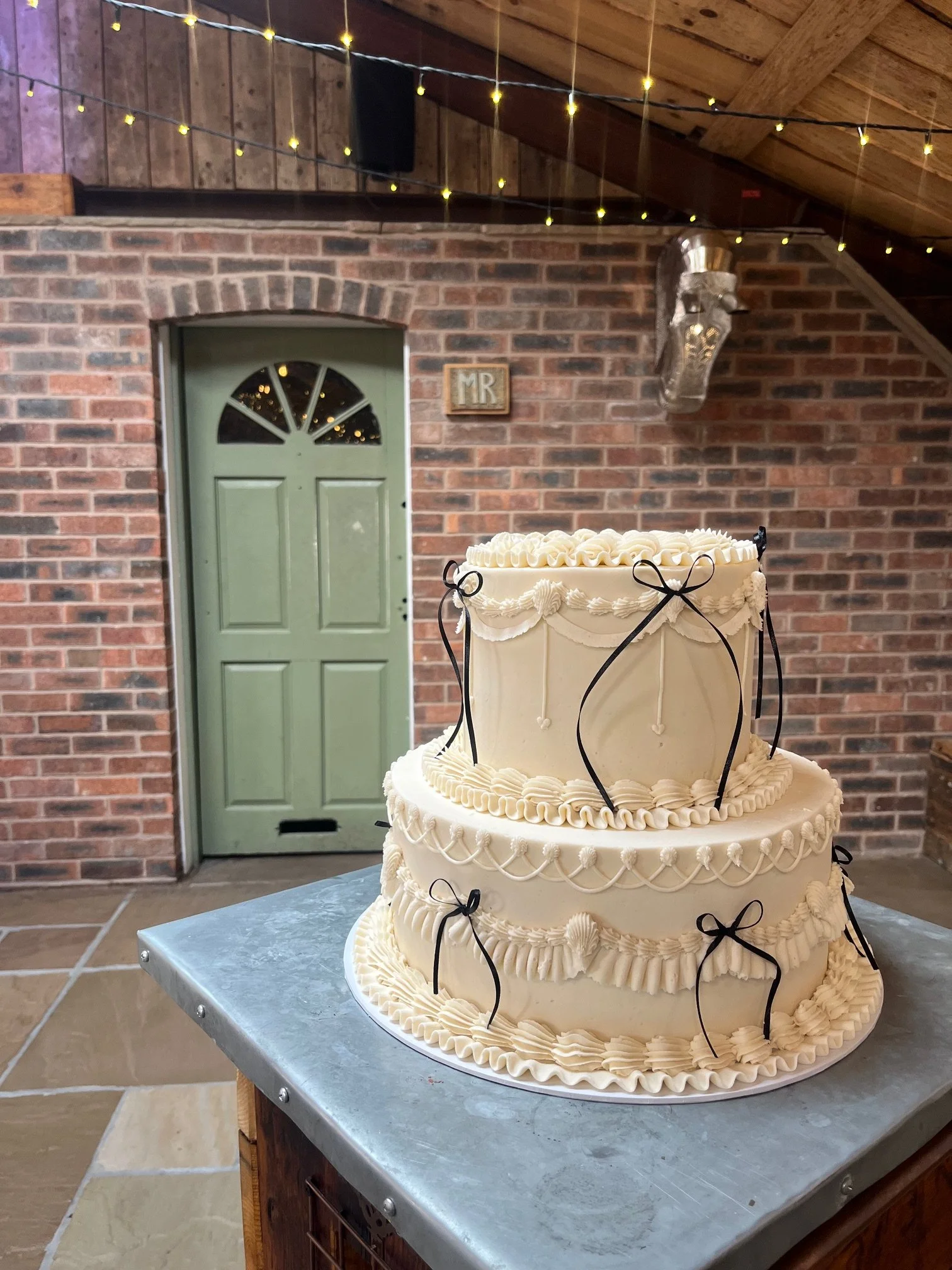 Two tier wedding cake with bows