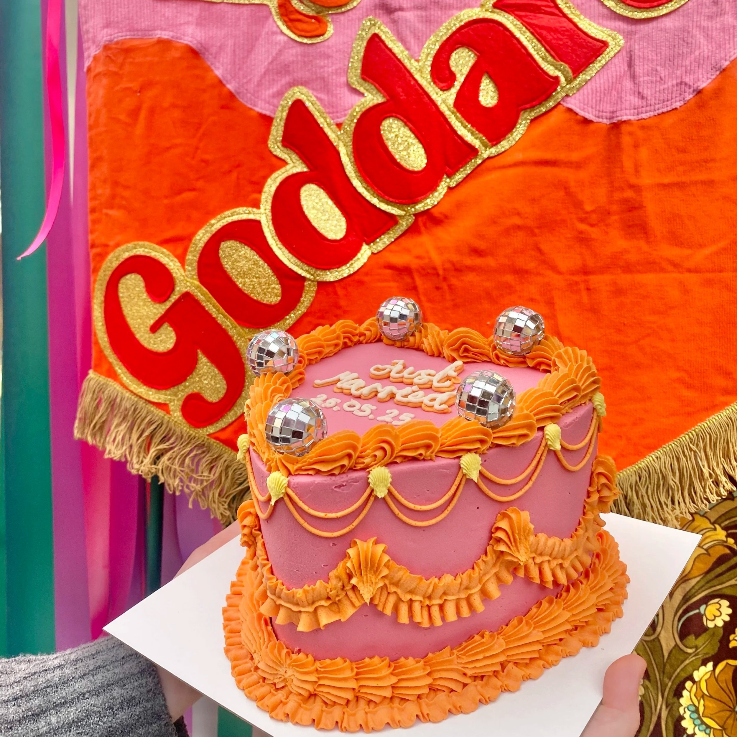 Pink and orange heart shape cake