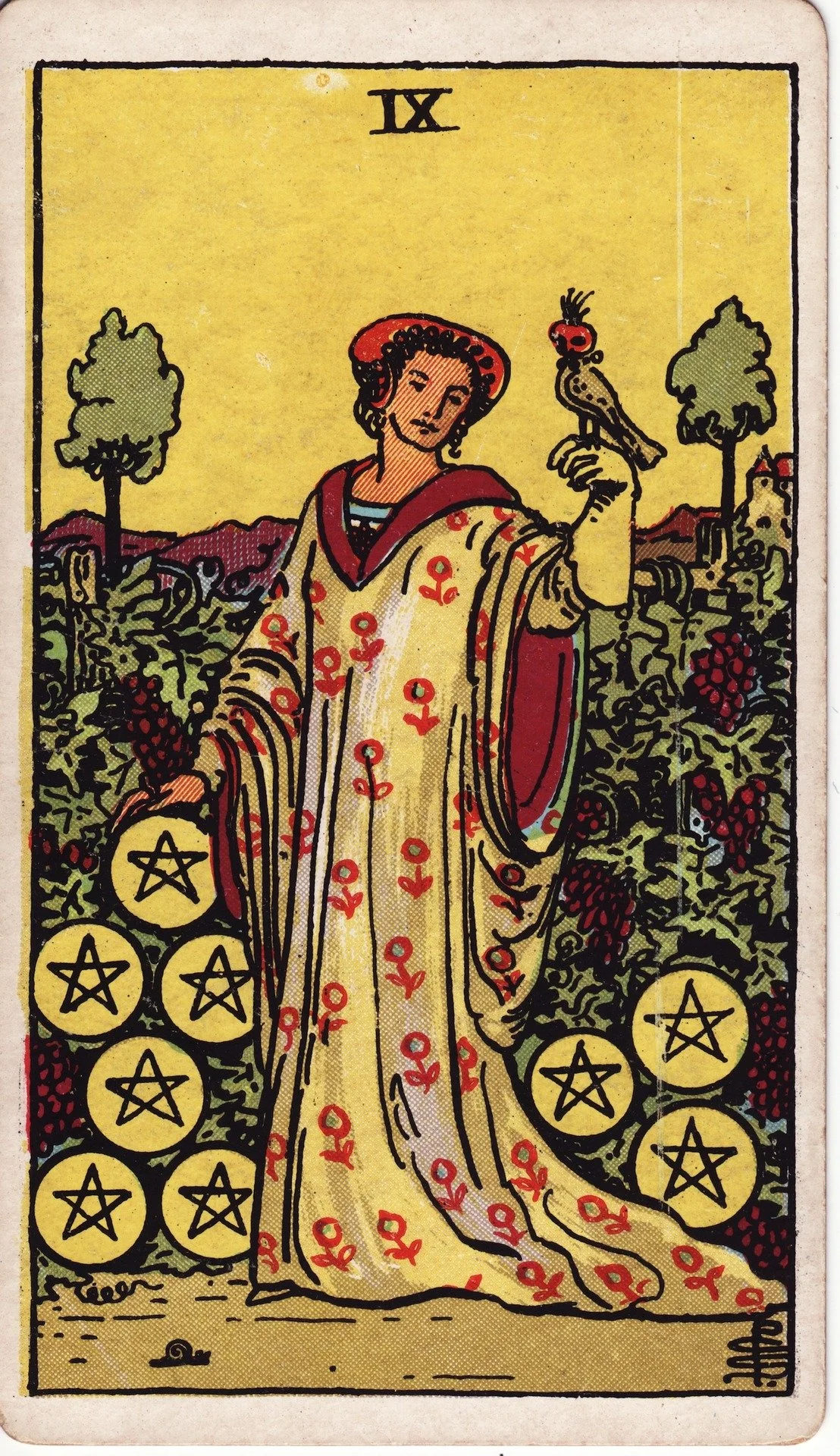 The Nine of Pentacles tarot card depicted with a woman in a garden, holding a bird on her hand, surrounded by grapes and pentacles.