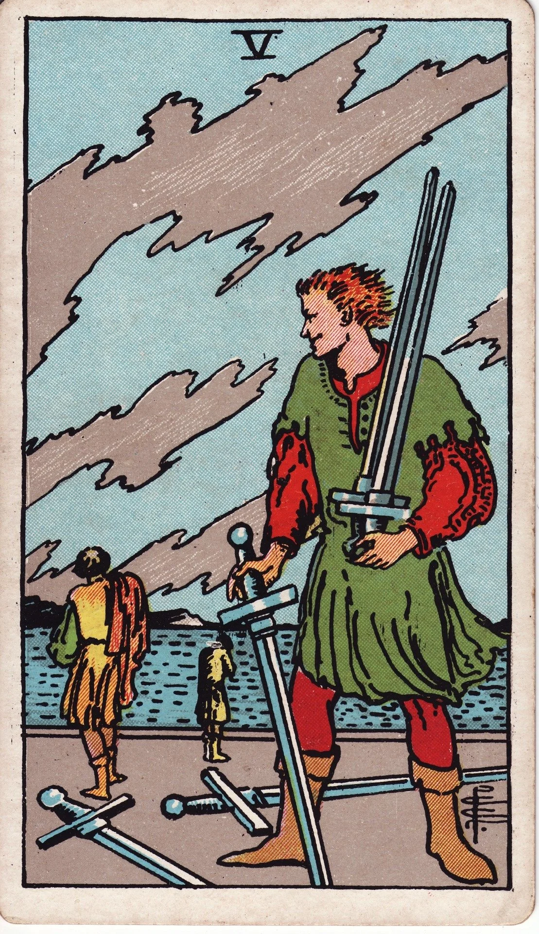 The Five of Swords tarot card depicting a person holding two swords, with three swords on the ground, and two small figures walking away in the background against a landscape with clouds.