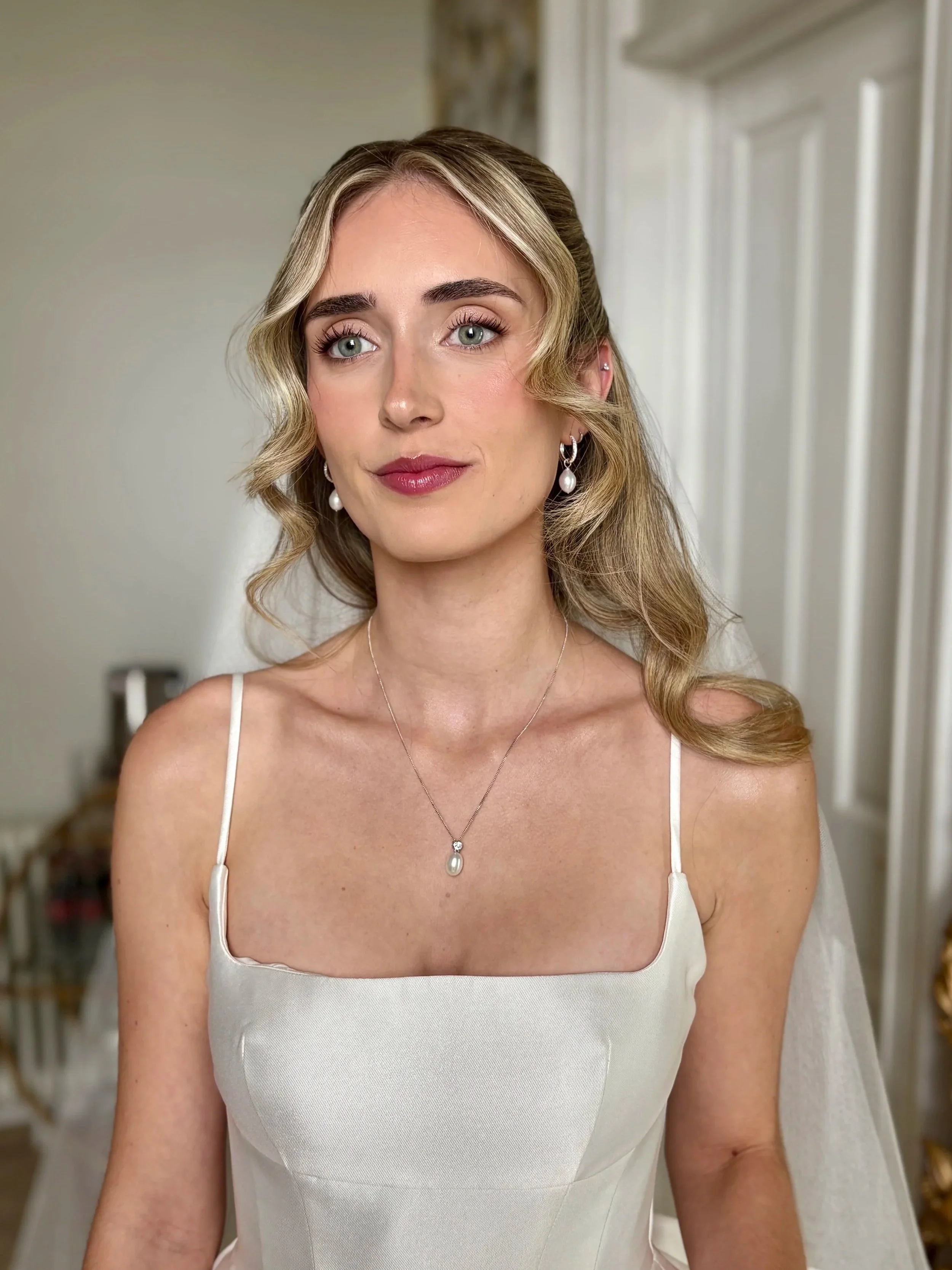 Natural bridal makeup inspiration on blonde bride with blue eyes 