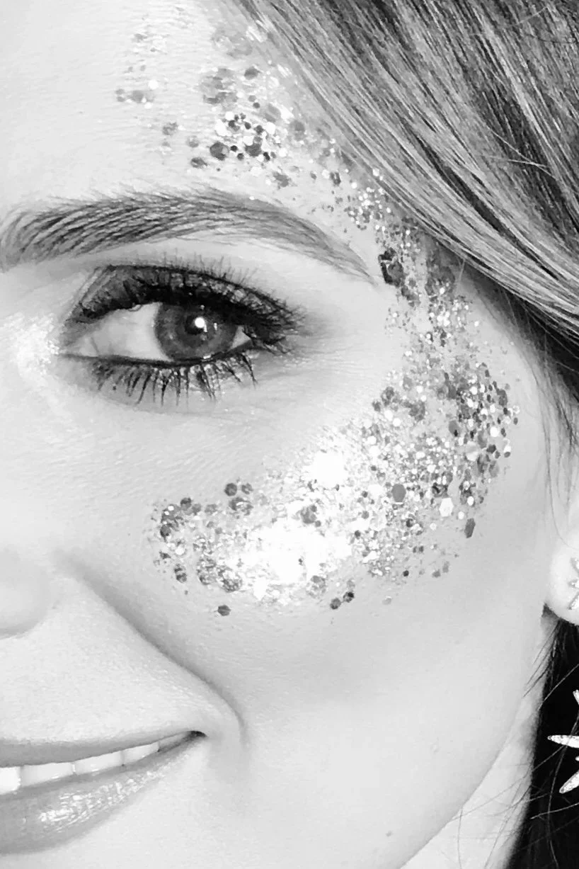 luxury makeup bar with glitter station for a fun evening wedding reception idea for guests