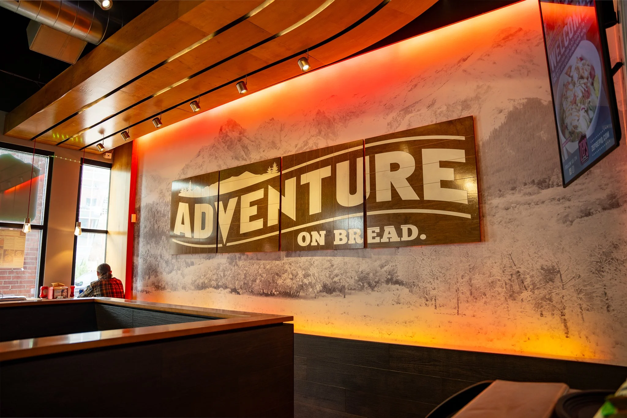 Zeps EPIQ interior sign "Adventure on Bread"