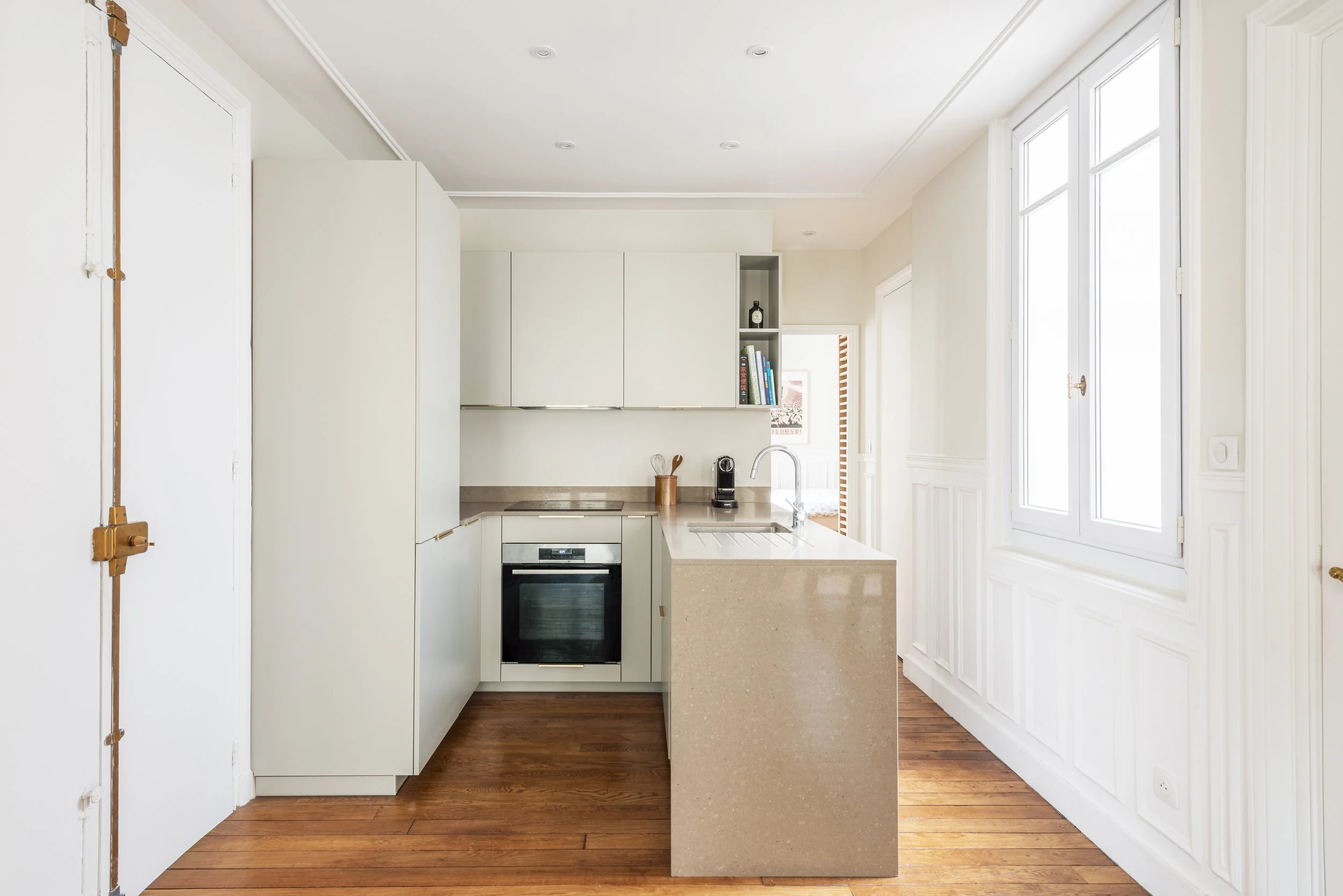Rénovation d'un appartement haussmannien cuisine ouverte Ilaria Festa Architecture Paris 