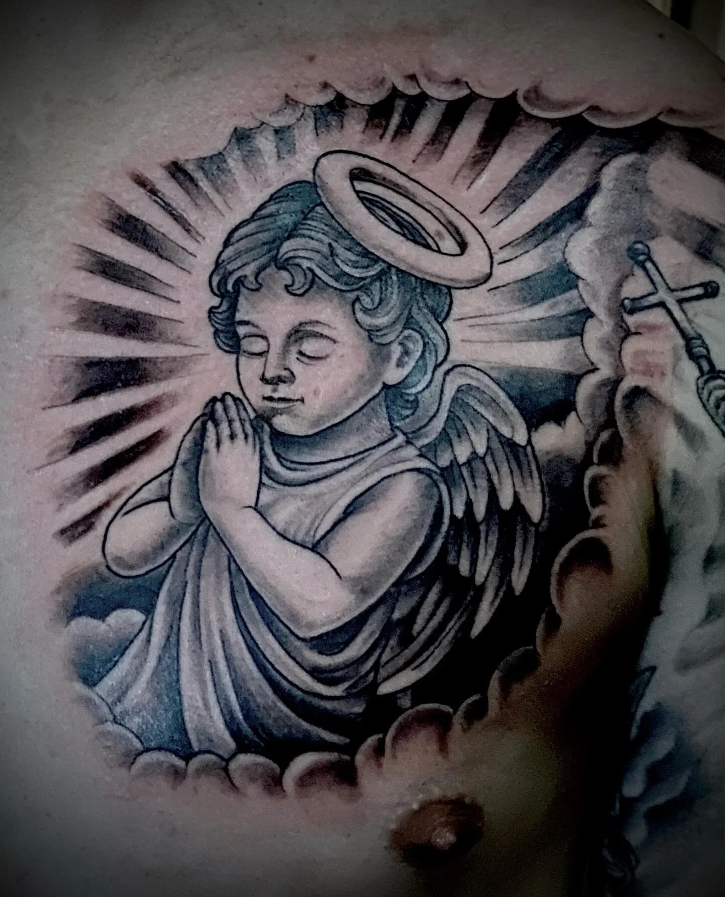 Little angel from some flash a client brought in. 

#blackandgreytattoos #angeltattoo #duluthtattooartist #minnesotatattooartist #duluthmn