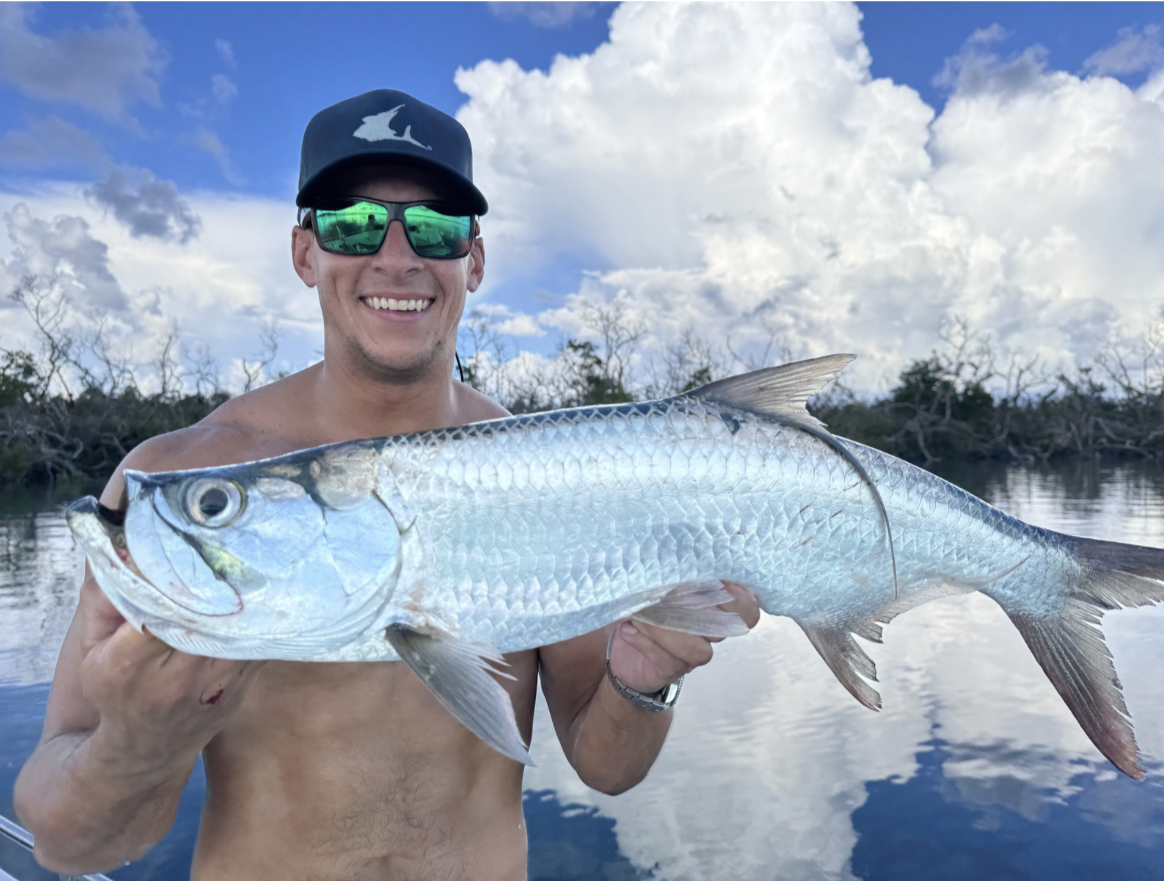 Chris posing with a beautiful Tarpon