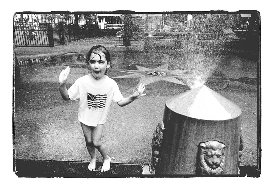 Girl in Sprinkler 4th of July.jpg