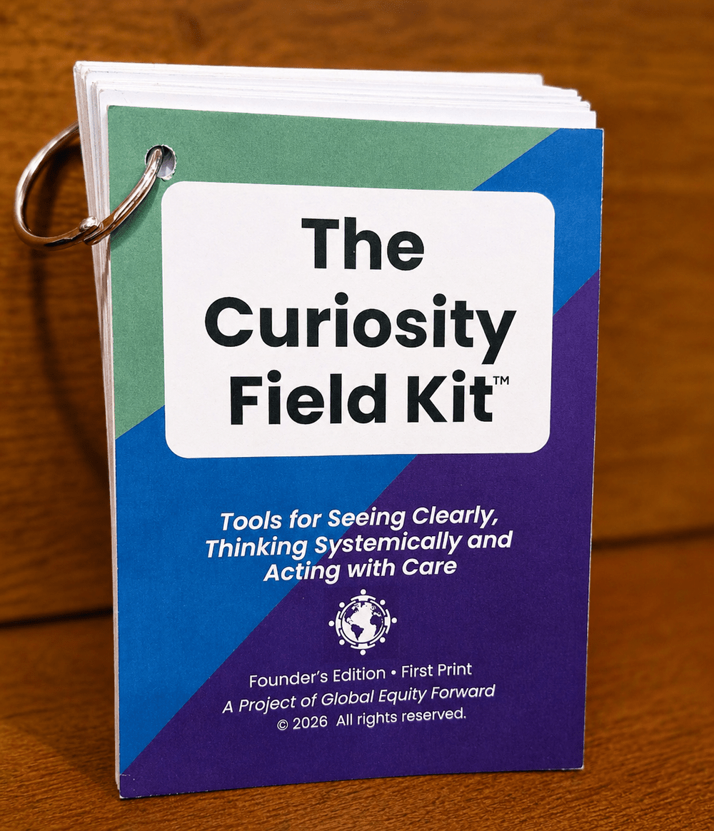 The Curiosity Field Kit™ ring-bound deck standing upright, showing the Founder’s Edition cover.