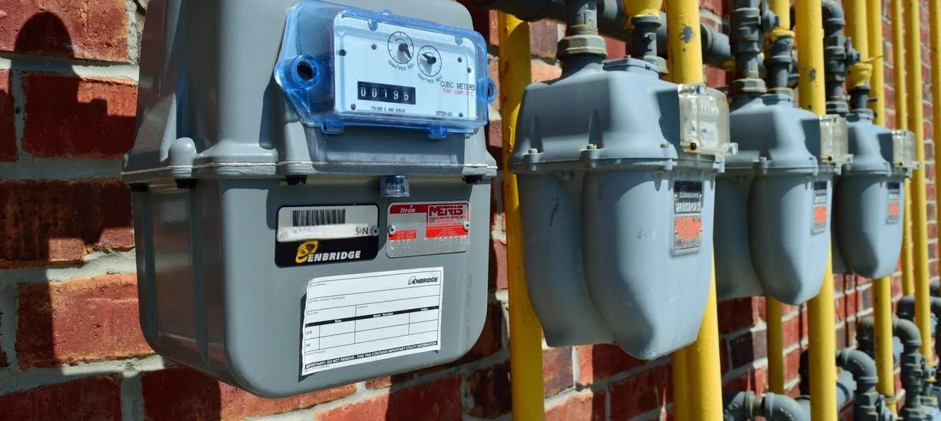 Enbridge gas meters on a building wall