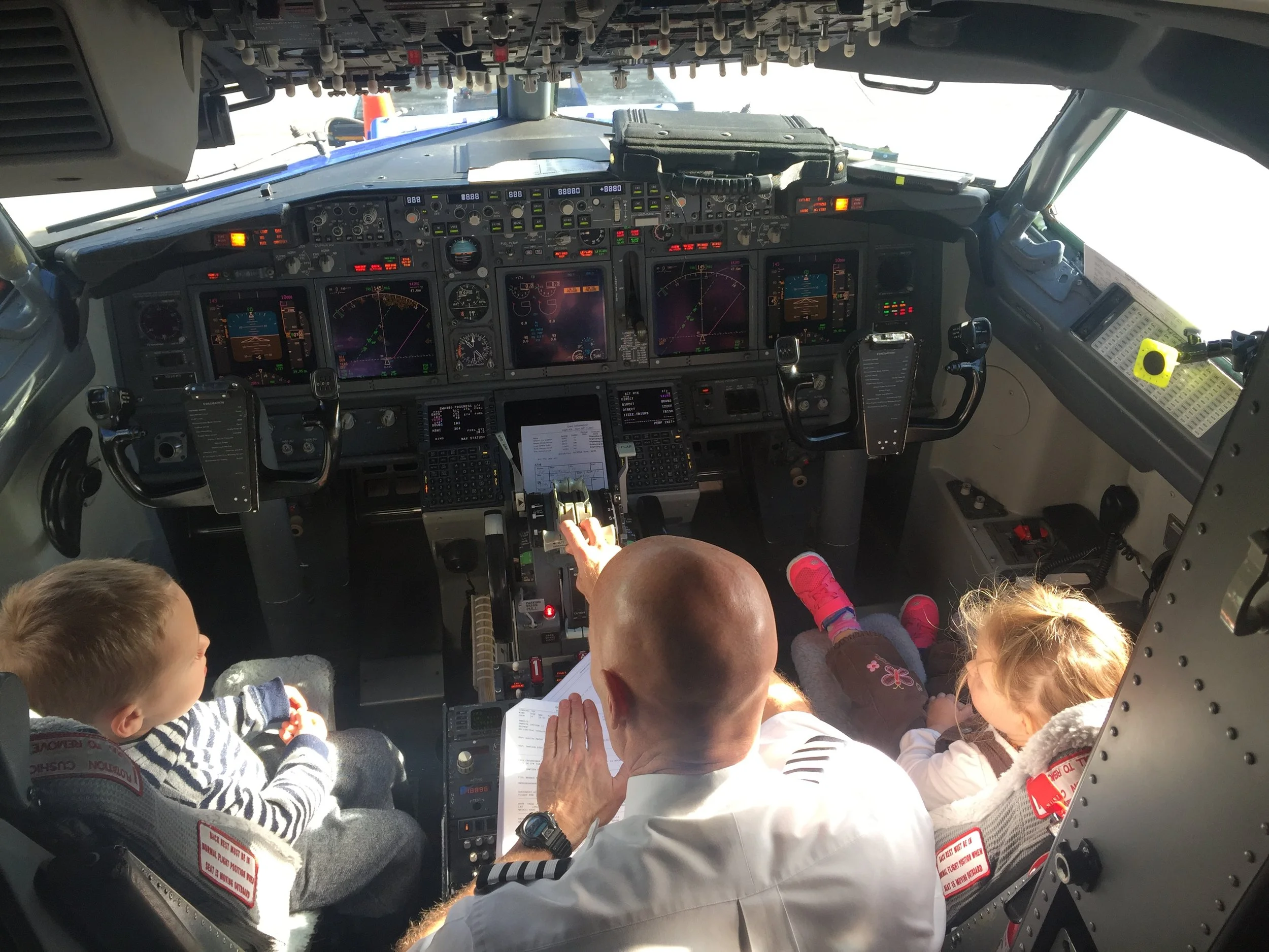 My son said "hi" to the pilot, and next thing we knew, the kids were getting a personal tour of the cockpit. They were thrilled.