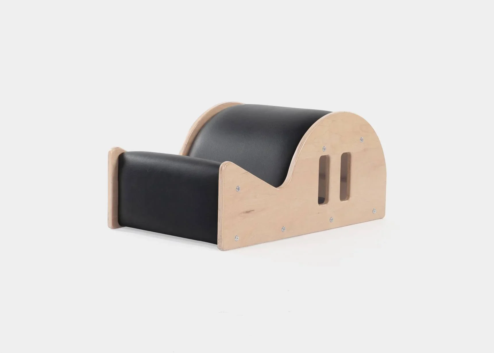 Wooden and black cushioned toddler chair or stool with a curved top and supporting side panels, set against a plain white background.
