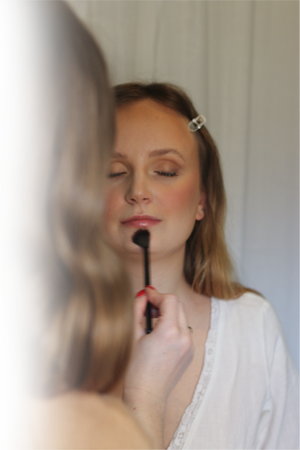 London makeup artist Molly dickson working on bridal client