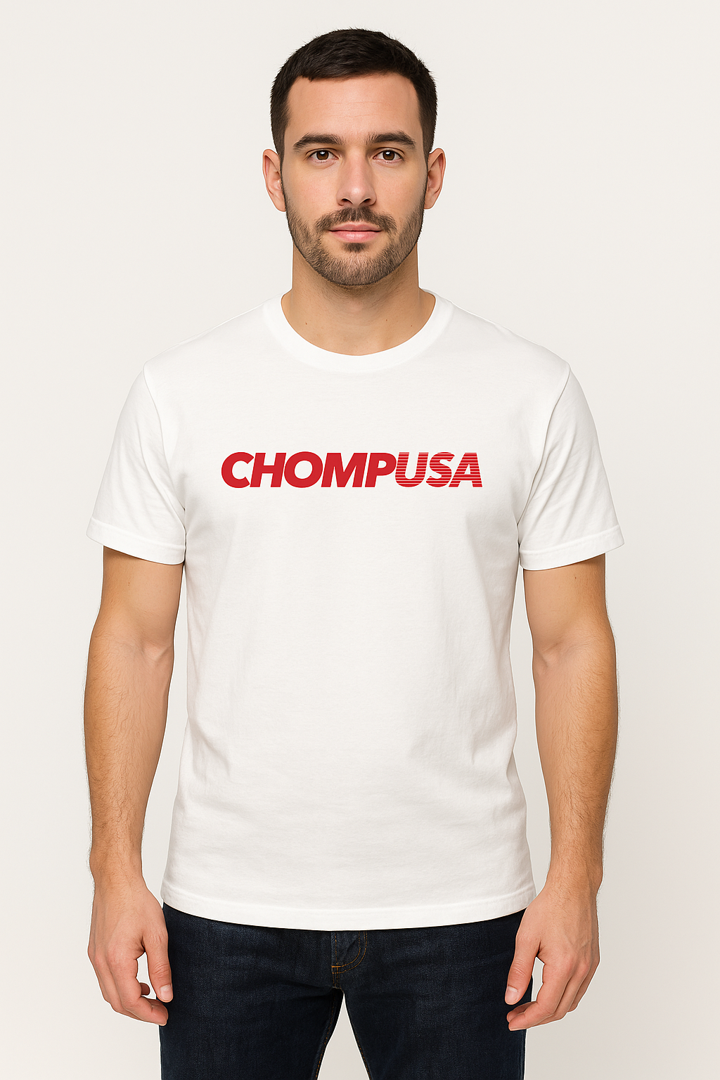 Man wearing a white T-shirt with red text that says 'CHOMP USA' standing against a plain light background.