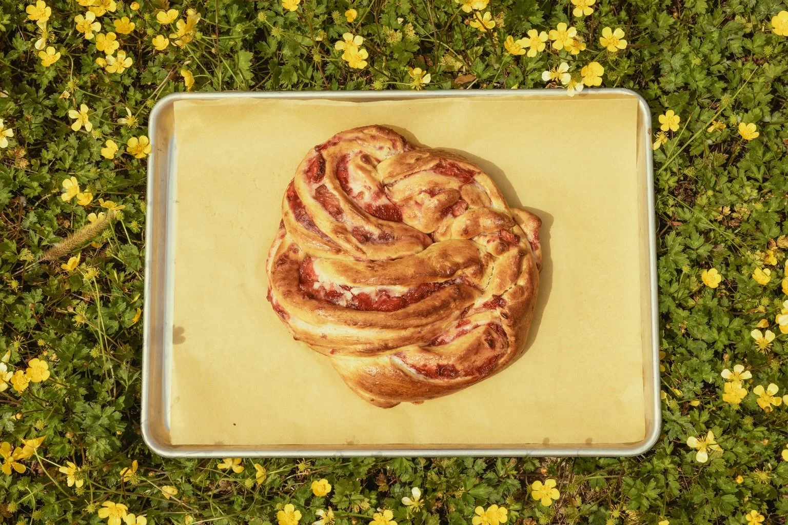 Our May treats never looked so good 🤩

&bull; strawberry cream cheese babka 
&bull; blueberry coffee cake danish 
&bull; monkey bread 

asheville coffee shop | christian coffee shop in Asheville, NC | Christian coffee shop in Arden | baked goods | b