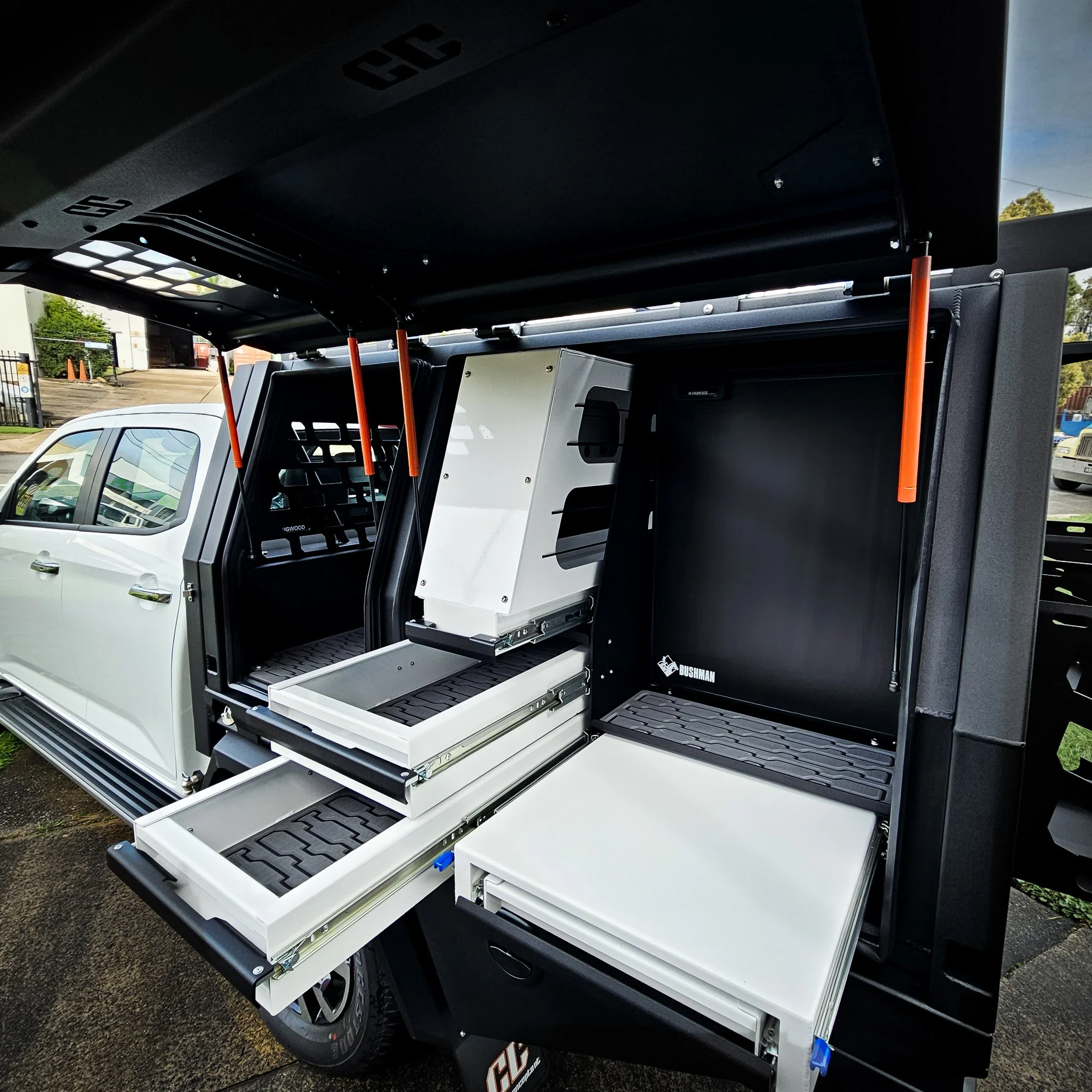 Premium Mazda BT-50 touring canopy featuring drawer storage system, fridge compartment and organised equipment layout.