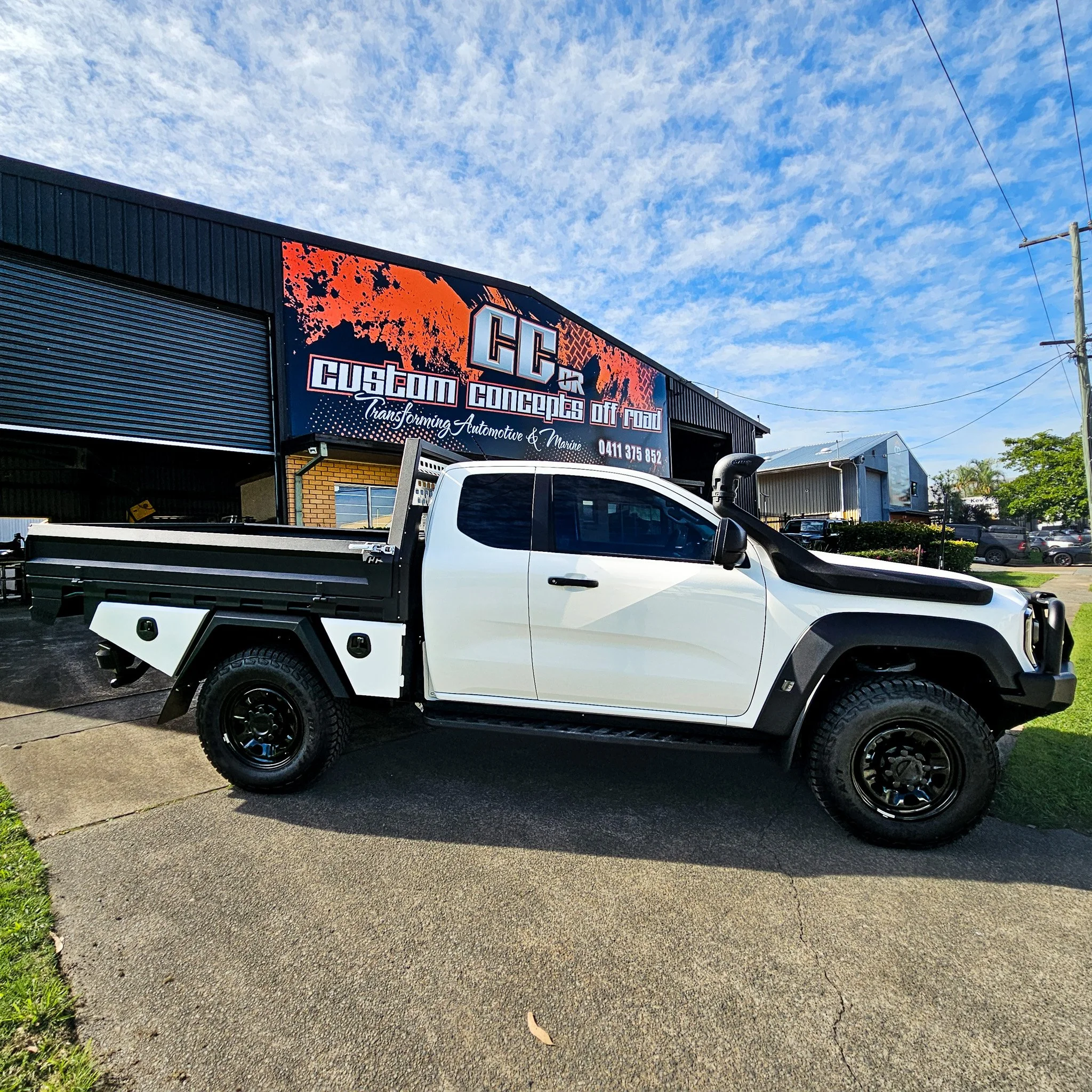 Custom aluminium tray fitted to a Ford Ranger Super Duty featuring under tray storage and heavy-duty construction for work and touring in Brisbane.