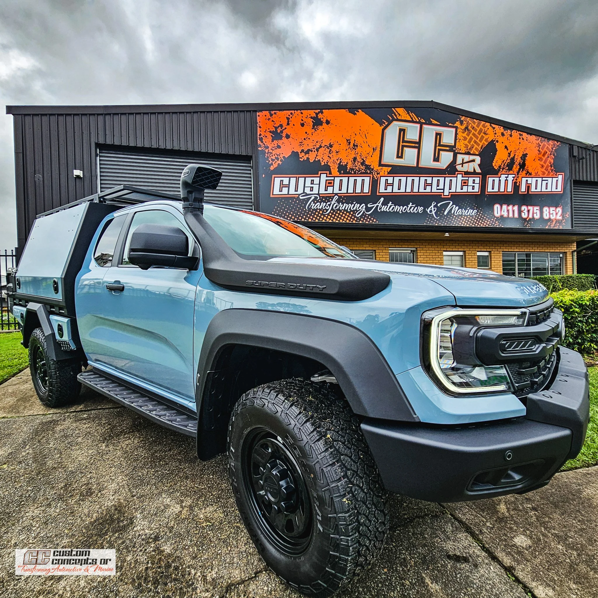 Front angle of a Ford Ranger Super Duty fitted with a custom aluminium chassis mount module.