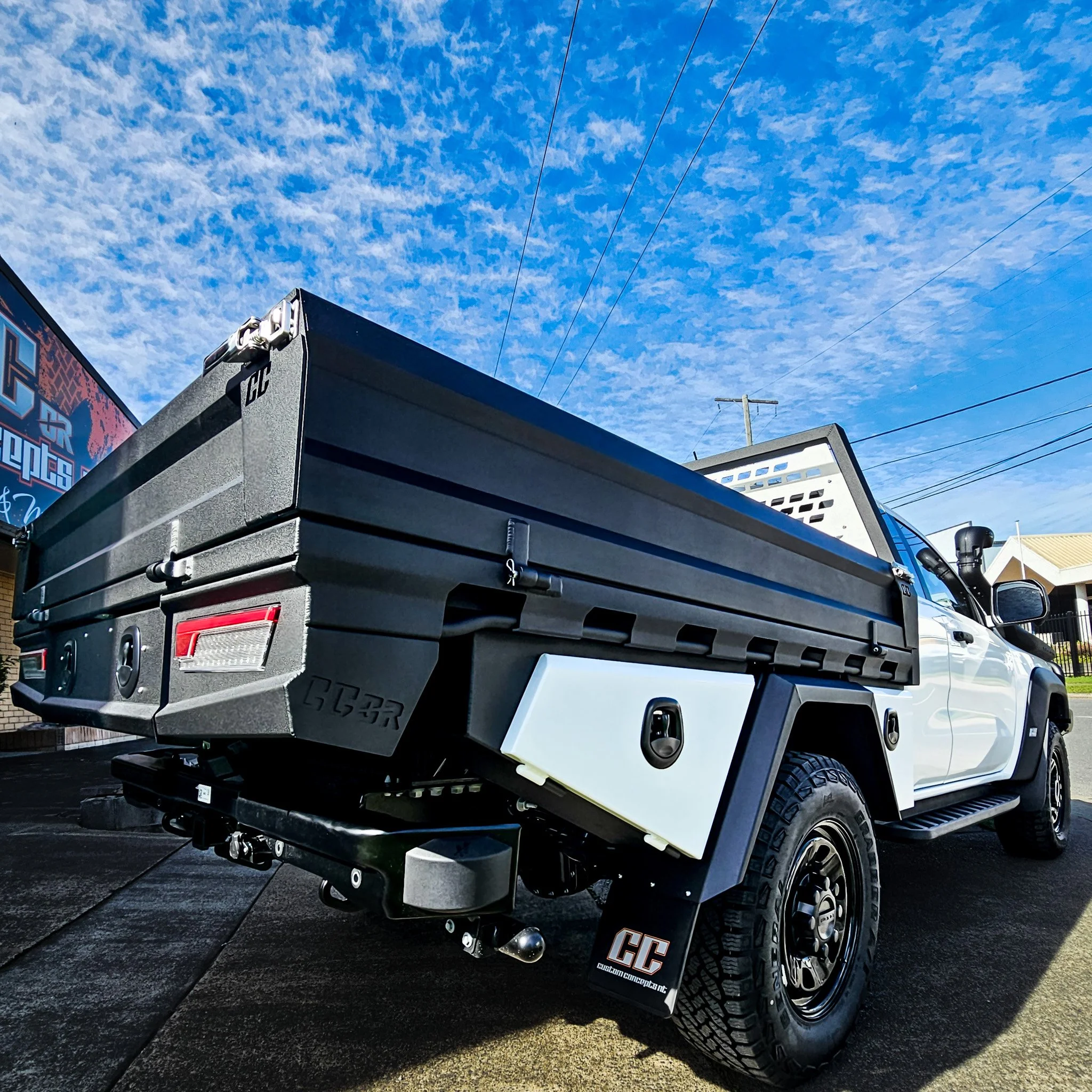 Heavy-duty aluminium tray built for a Ford Ranger Super Duty with integrated storage compartments and premium powder-coated finish.