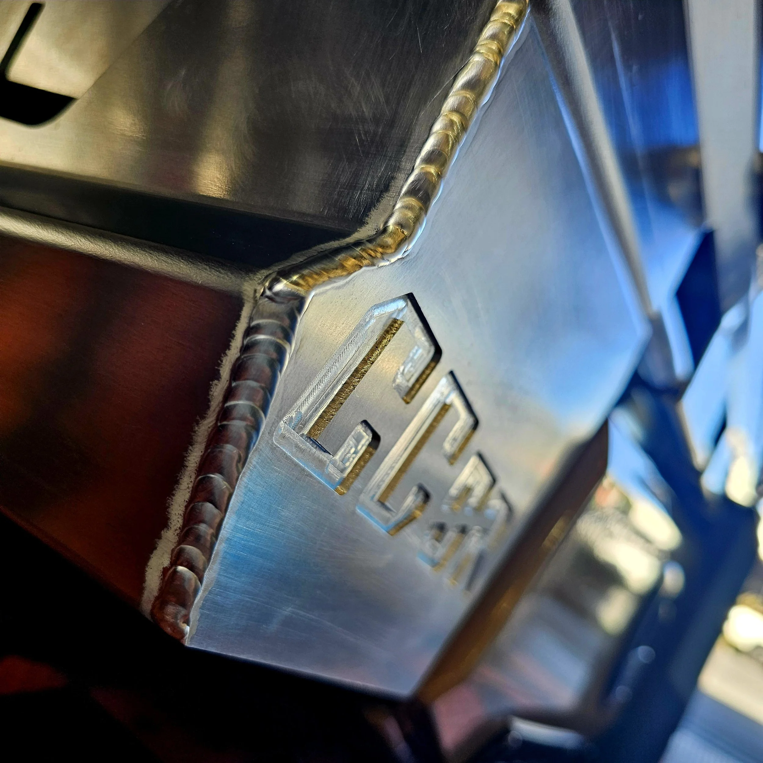 Close-up of precision aluminium welding on a custom fabricated ute tray component built in Brisbane.