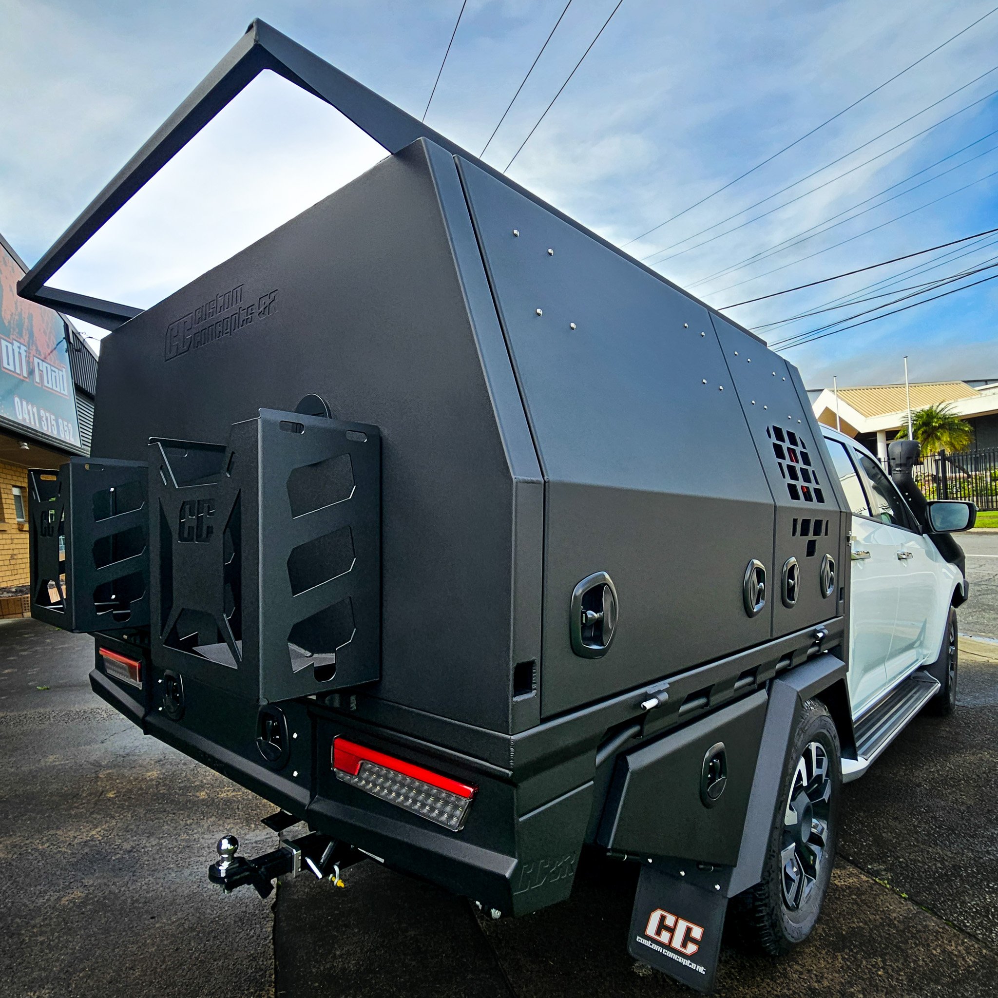 Close-up detail of custom fabricated aluminium tray and canopy showing premium powder coating, integrated toolbox and precision workmanship.